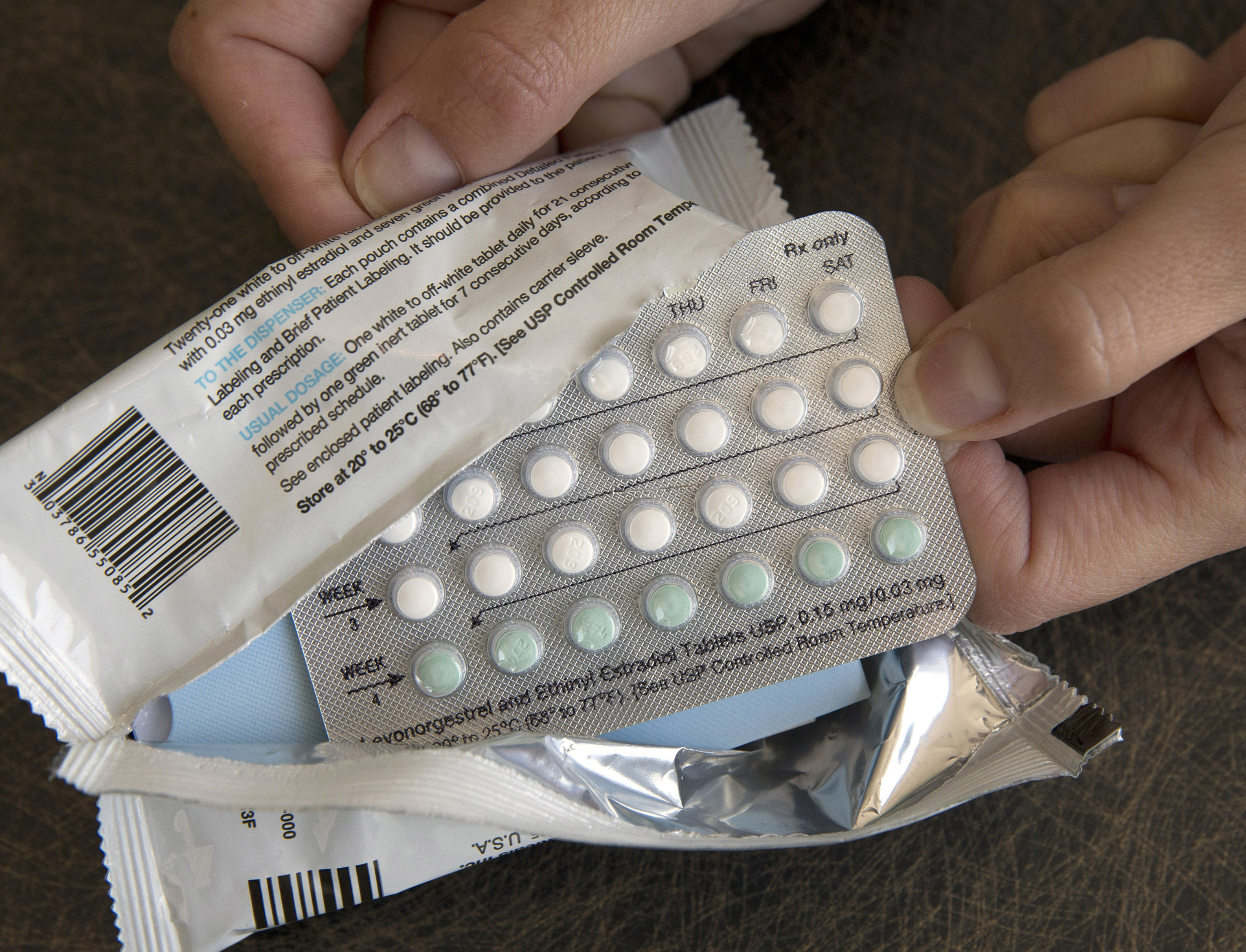 FILE - A one-month dosage of hormonal birth control pills is displayed in Sacramento, Calif., Aug. 26, 2016. (AP Photo/Rich Pedroncelli, File)