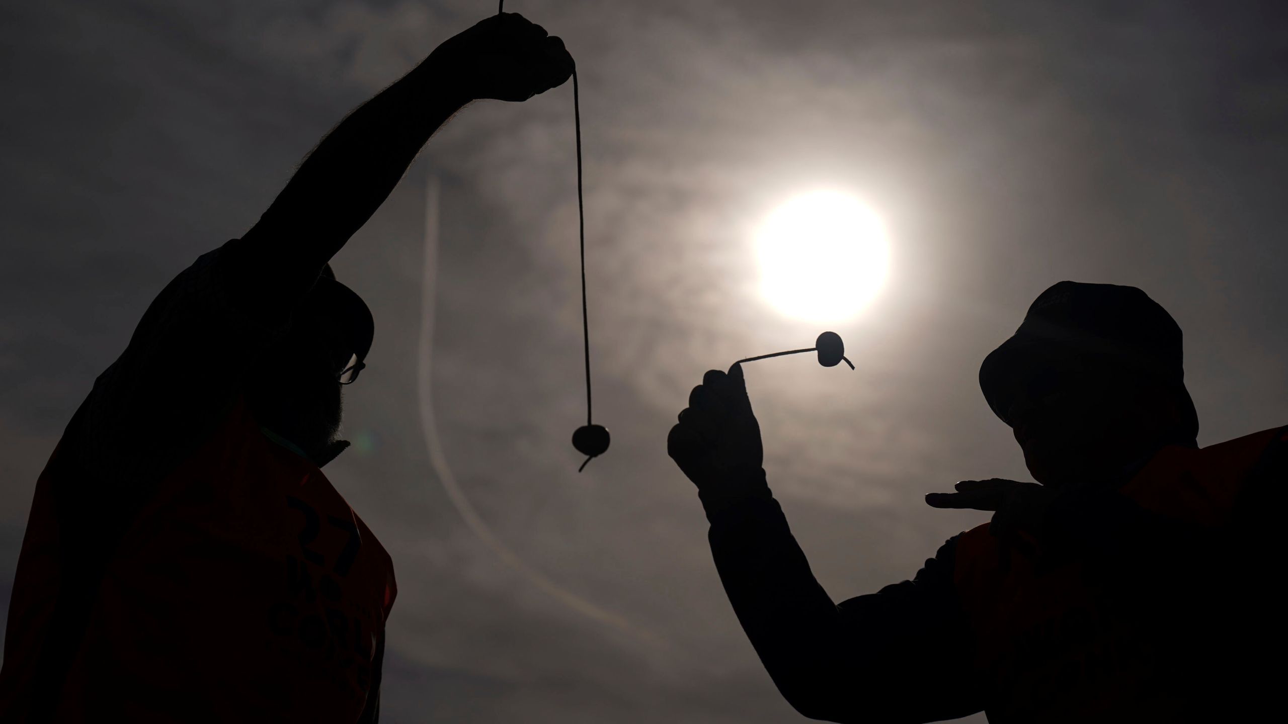 Competitors take part in the annual World Conker Championships at the Shuckburgh Arms in Southwick, Peterborough, England, Sunday Oct. 13, 2024. (Jacob King/PA via AP)