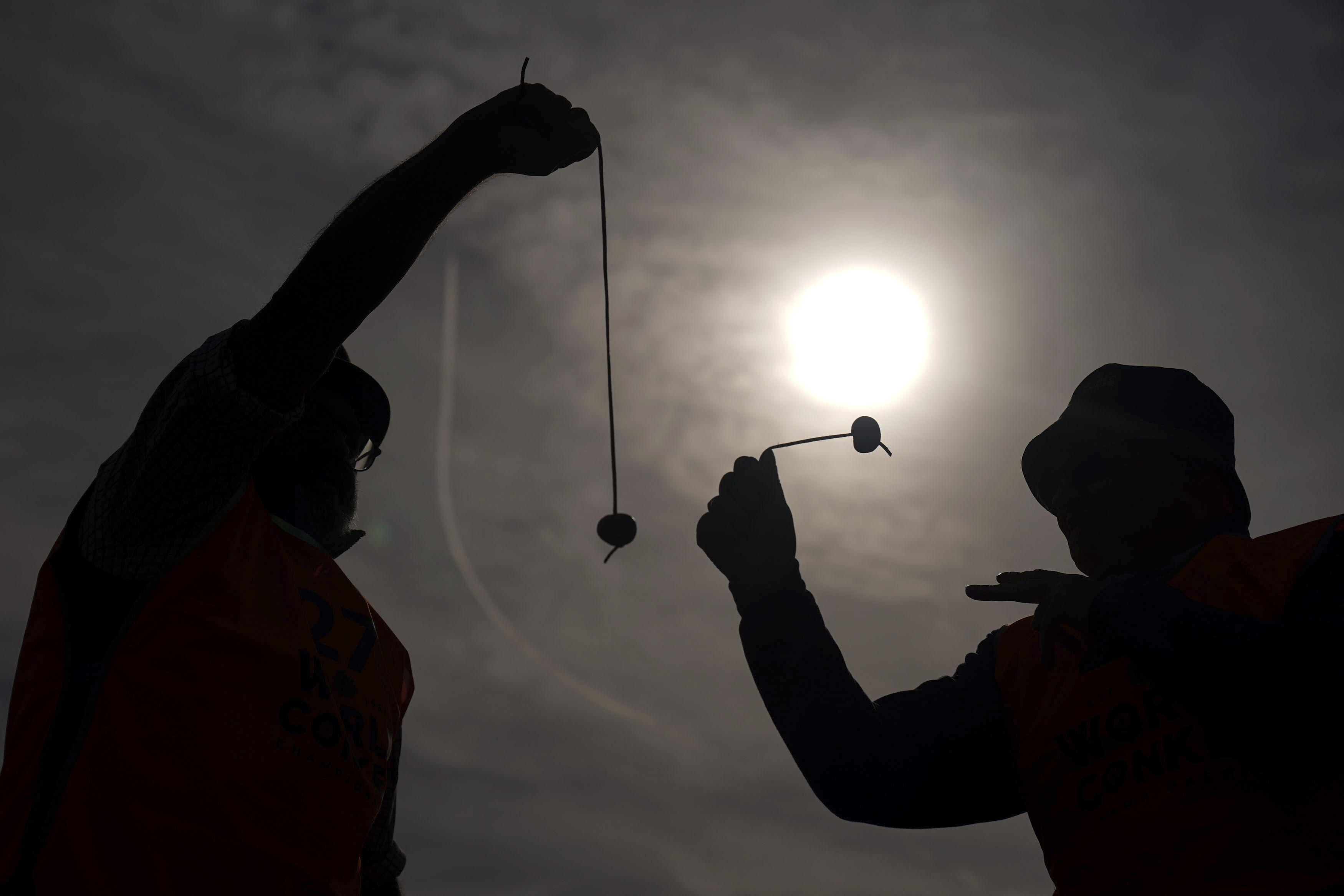 Competitors take part in the annual World Conker Championships at the Shuckburgh Arms in Southwick, Peterborough, England, Sunday Oct. 13, 2024. (Jacob King/PA via AP)