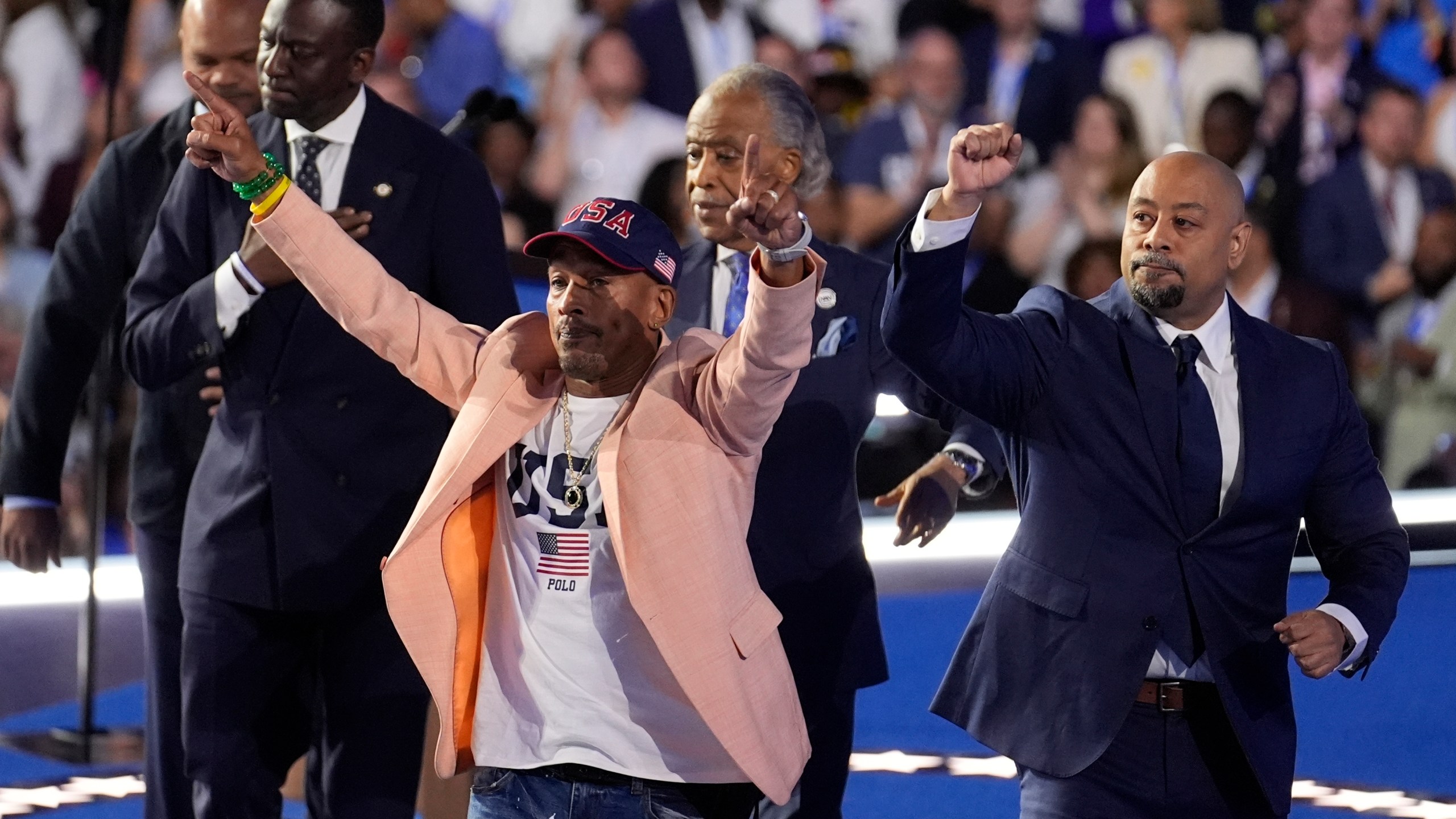 FILE - The Central Park Five join Reverend Al Sharpton during the Democratic National Convention, Aug. 22, 2024, in Chicago. (AP Photo/Charles Rex Arbogast, file)