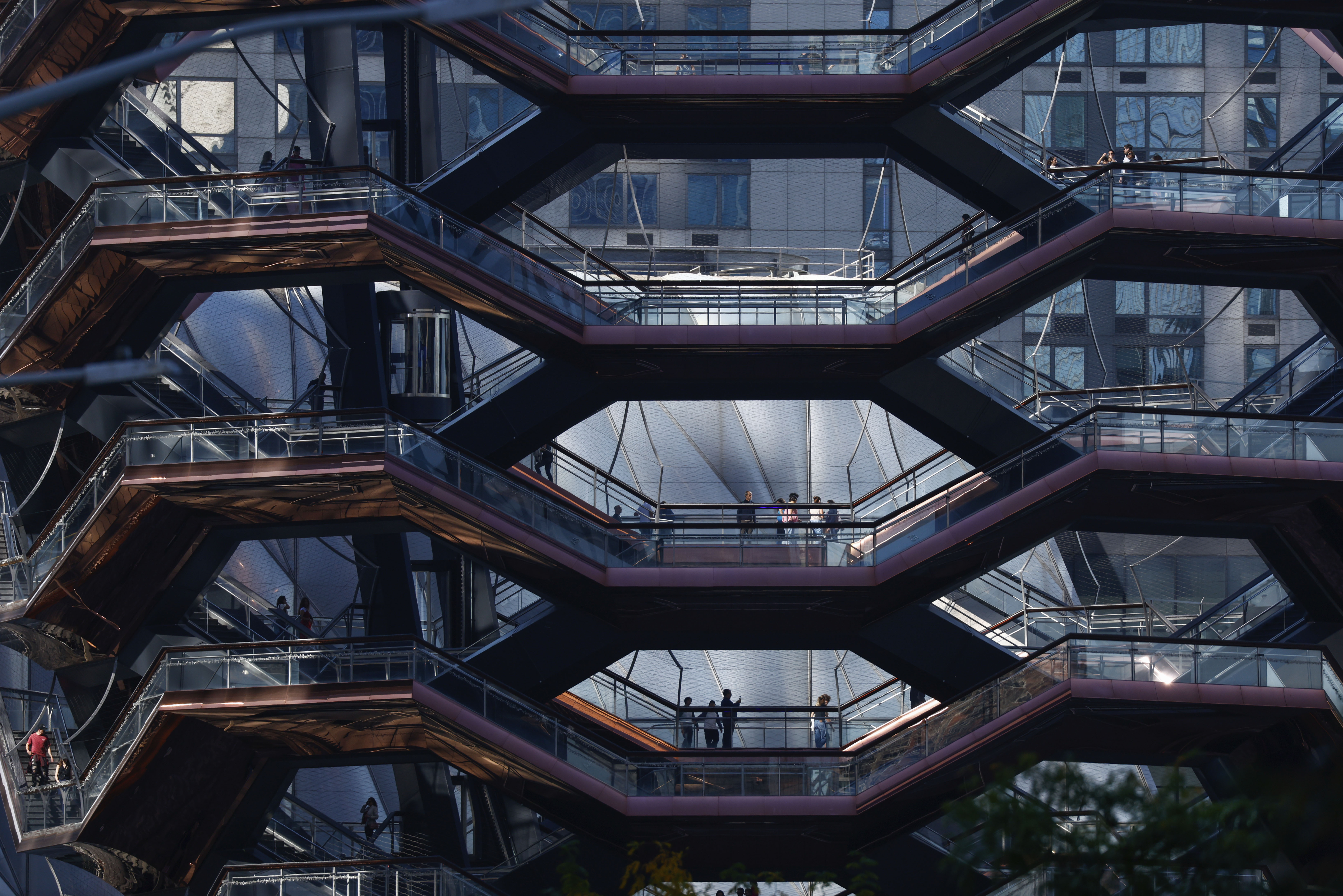 People visit the Vessel as it reopens with safety features in New York, Monday, Oct. 21, 2024. (AP Photo/Kena Betancur)