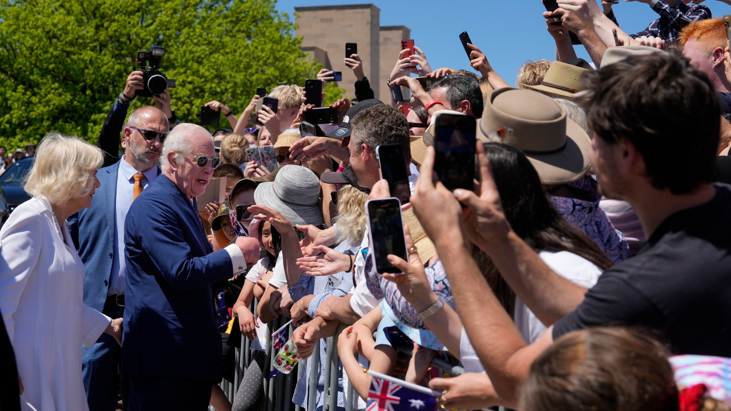 Britain's King Charles III, and Queen Camilla greets by public at the Australian War Memorial in Canberra, Monday, Oct. 21, 2024. (AP Photo/Mark Baker, Pool)