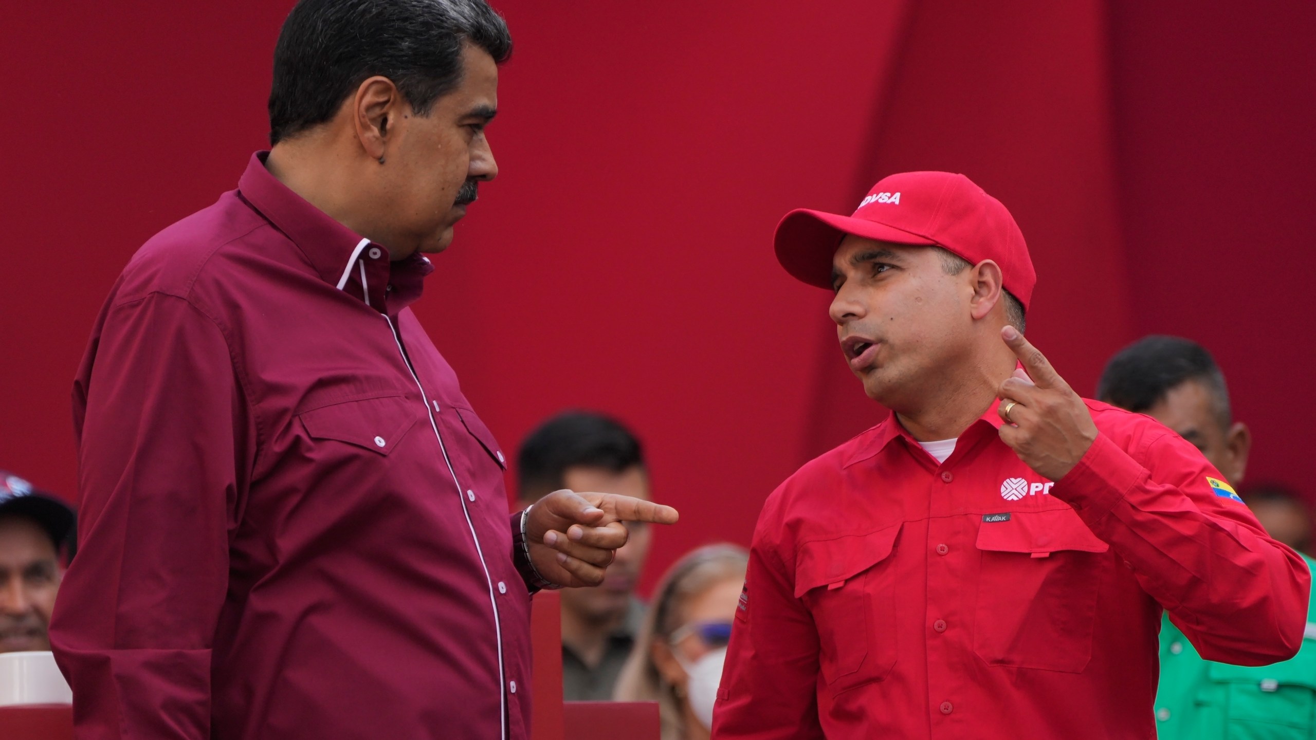 FILE - Venezuelan President Nicolás Maduro, left, speaks with Pedro Tellechea, the oil minister and president of the Venezuelan state oil company PDVSA, during a May Day event in Caracas, Venezuela, May 1, 2023. (AP Photo/Ariana Cubillos, File)