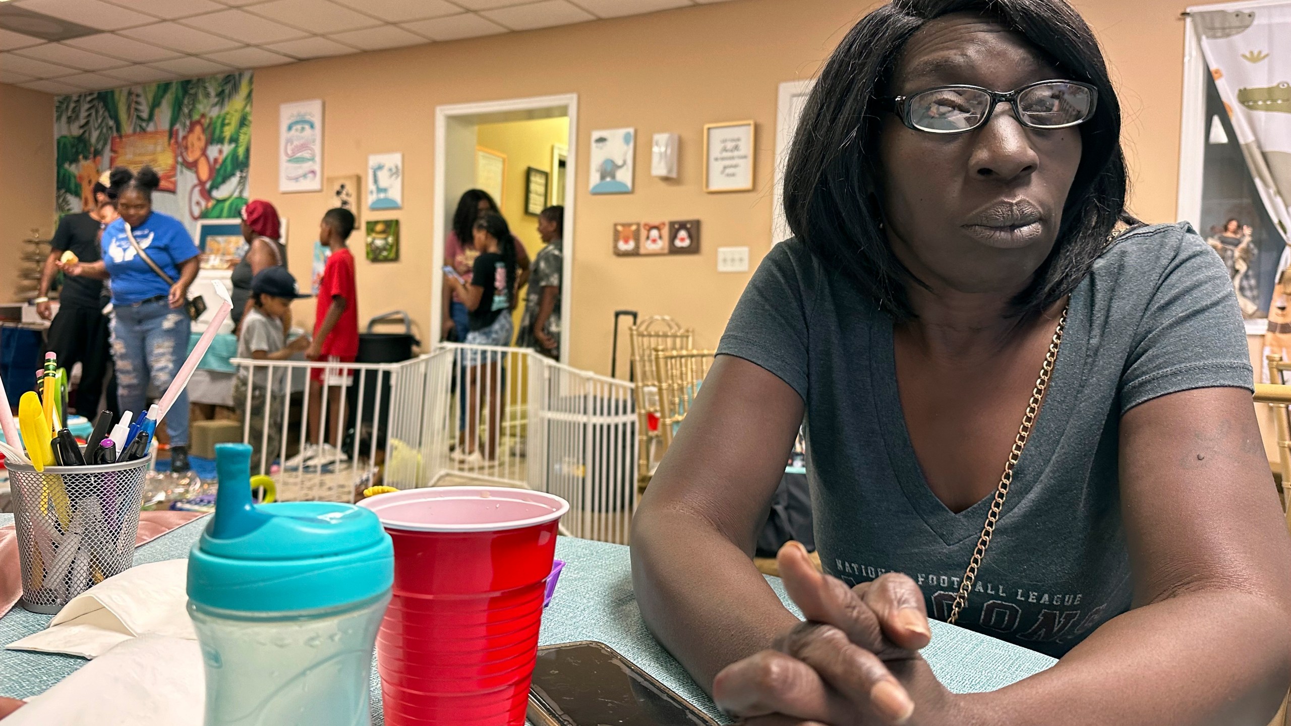 Linda Solomon, a client at Mother's Nest in Macon, Ga., poses for a photo on June 22, 2024. She does not intend to vote because she feels the lives of the poor don't improve regardless of what party controls the White House and government. (AP Photo/Gary Fields)