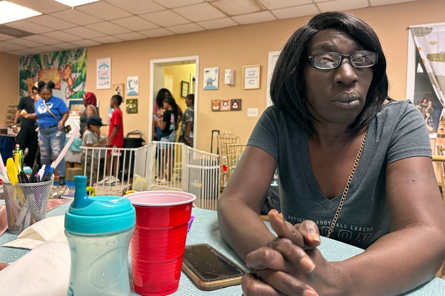 Linda Solomon, a client at Mother's Nest in Macon, Ga., poses for a photo on June 22, 2024. She does not intend to vote because she feels the lives of the poor don't improve regardless of what party controls the White House and government. (AP Photo/Gary Fields)