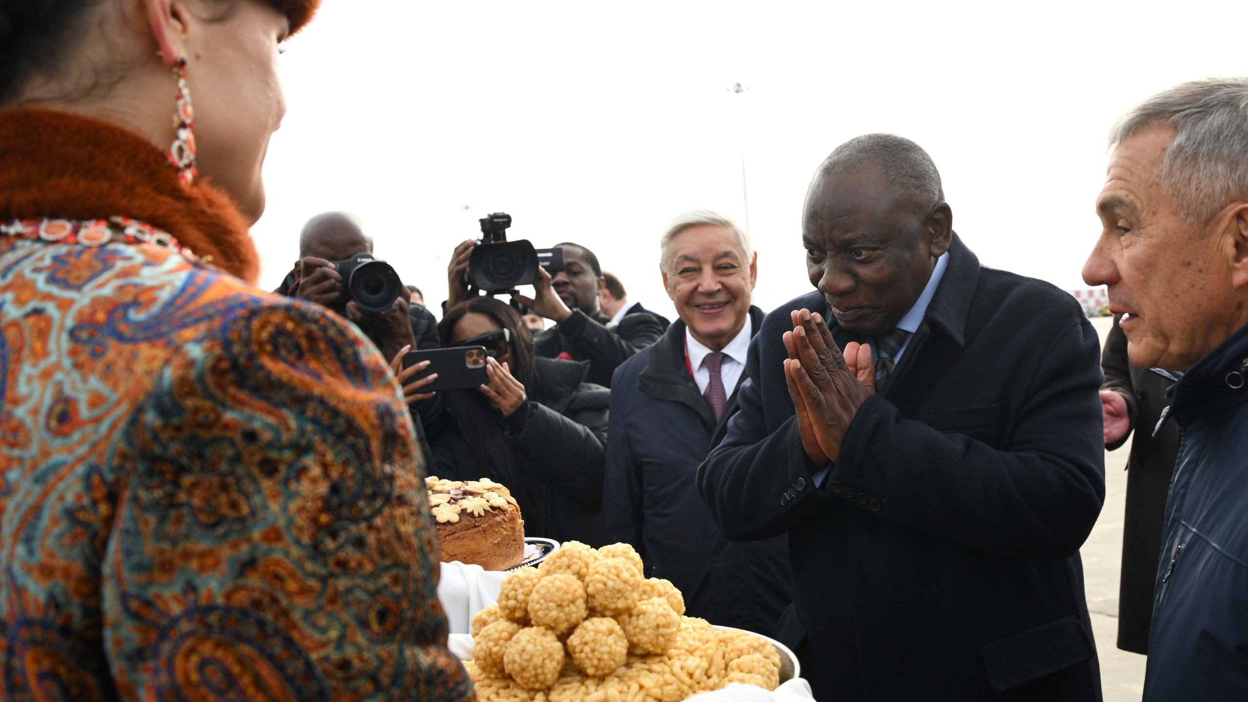 South African President Cyril Ramaphosa, 2nd right, arrives at Kazan International Airport prior to the BRICS summit in Kazan, Russia, Tuesday, Oct. 22, 2024. (Kirill Zykov/Photo host brics-russia2024.ru via AP)