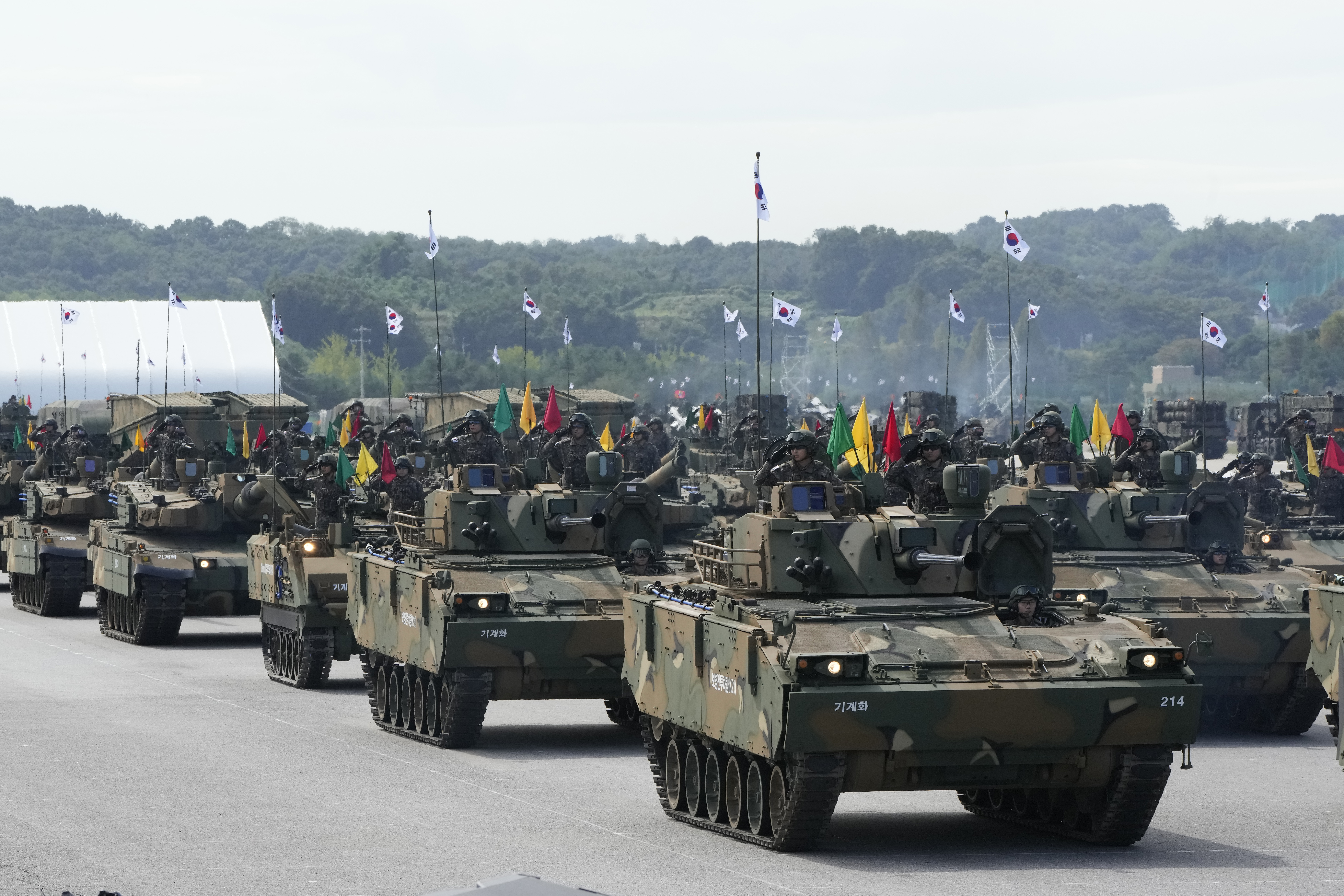 FILE - South Korean mechanized unit personnel parade with their armored vehicles during the media day for the 76th anniversary of Armed Forces Day at Seoul air base in Seongnam, South Korea, on Sept. 25, 2024. (AP Photo/Ahn Young-joon, File)