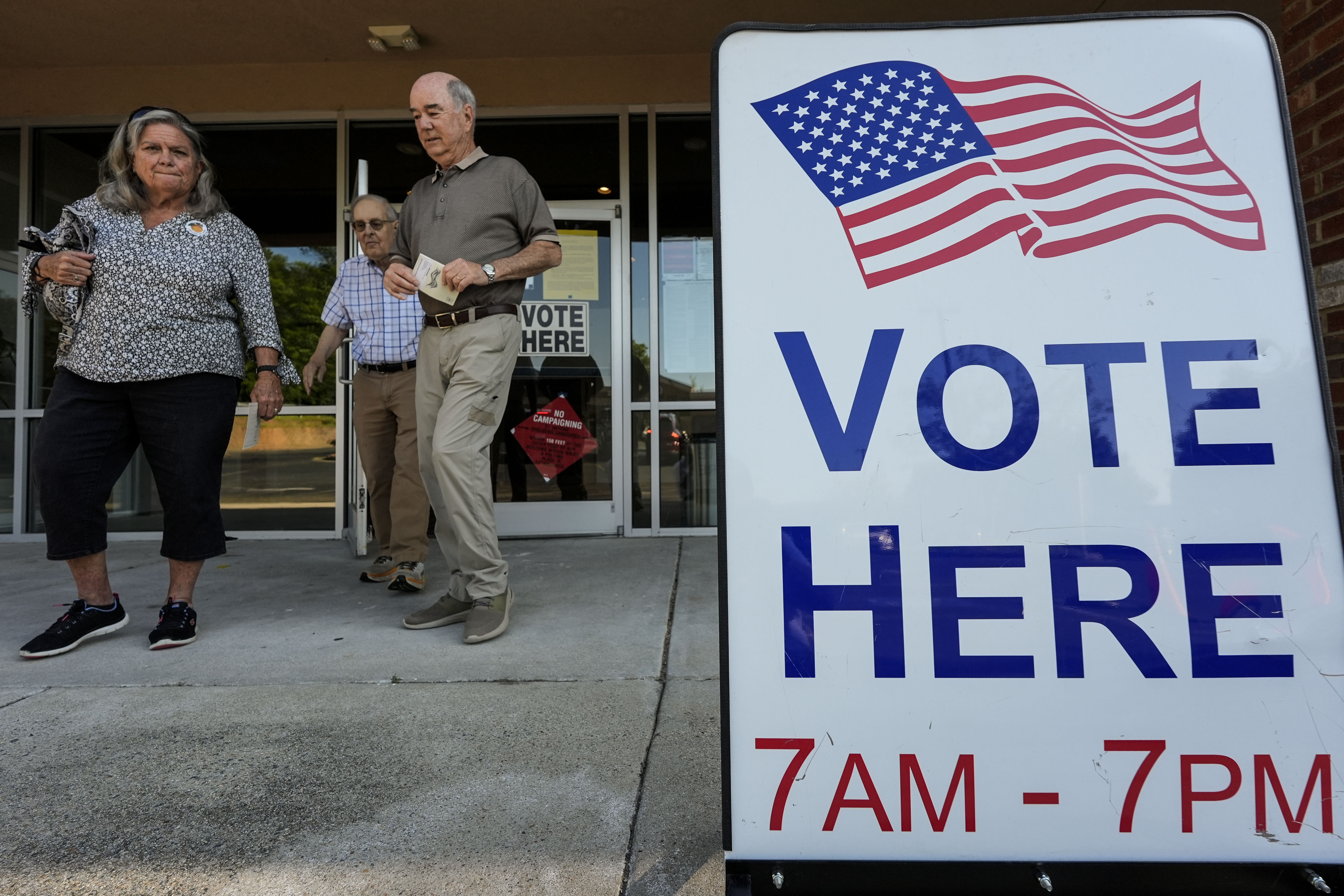 FILE - Voters depart an election center during primary voting, Tuesday, May 21, 2024, in Kennesaw, Ga. (AP Photo/Mike Stewart, File)