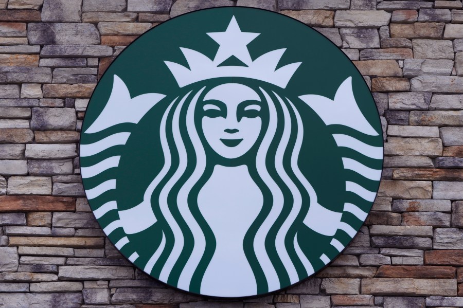 FILE - A Starbucks mermaid logo sign is displayed on a store, May 29, 2024, in Salem, N.H. (AP Photo/Charles Krupa, File)