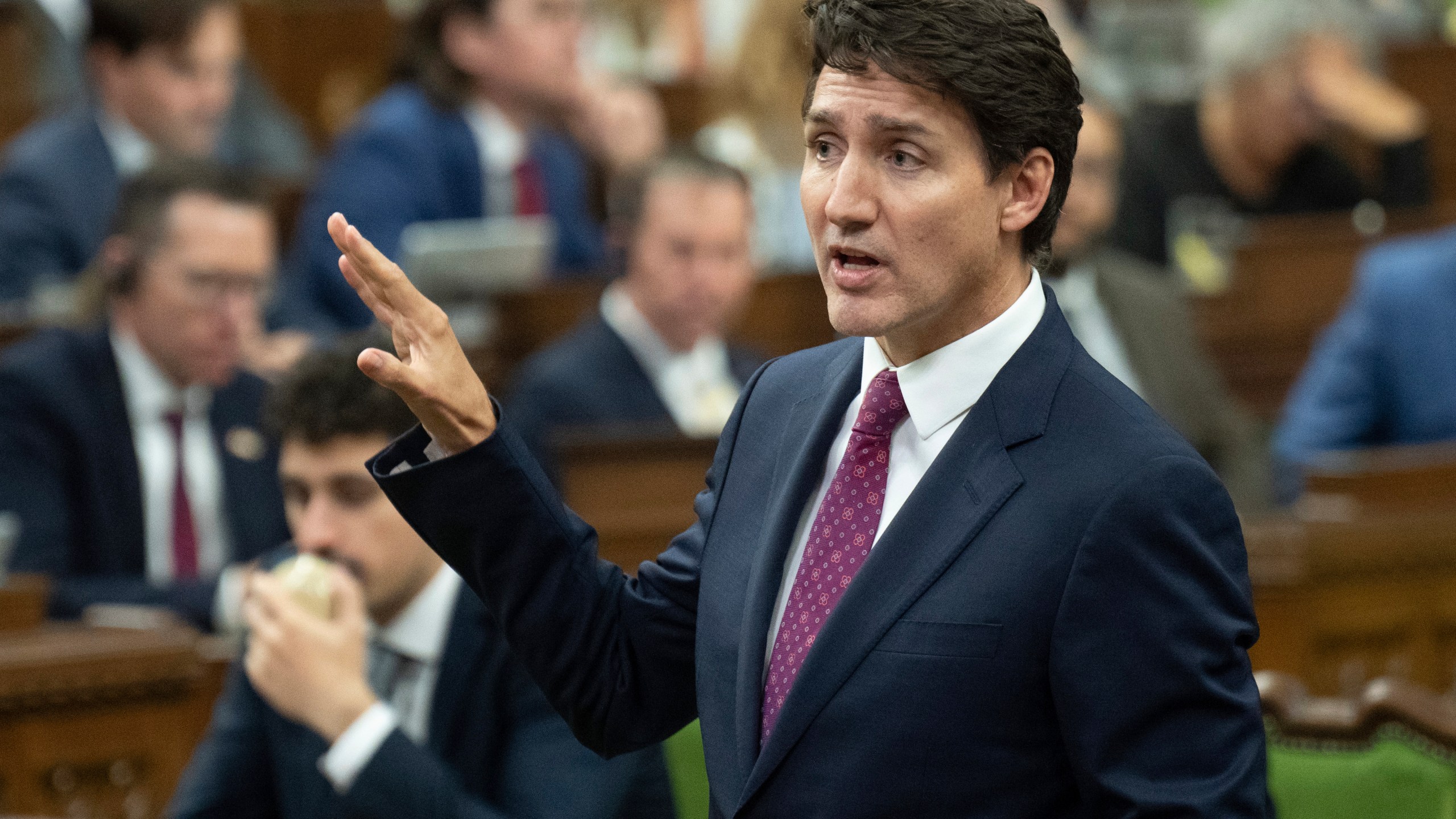 Canada Prime Minister Justin Trudeau rises during Question Period in Ottawa, Tuesday, Oct. 22, 2024. (Adrian Wyld/The Canadian Press via AP)