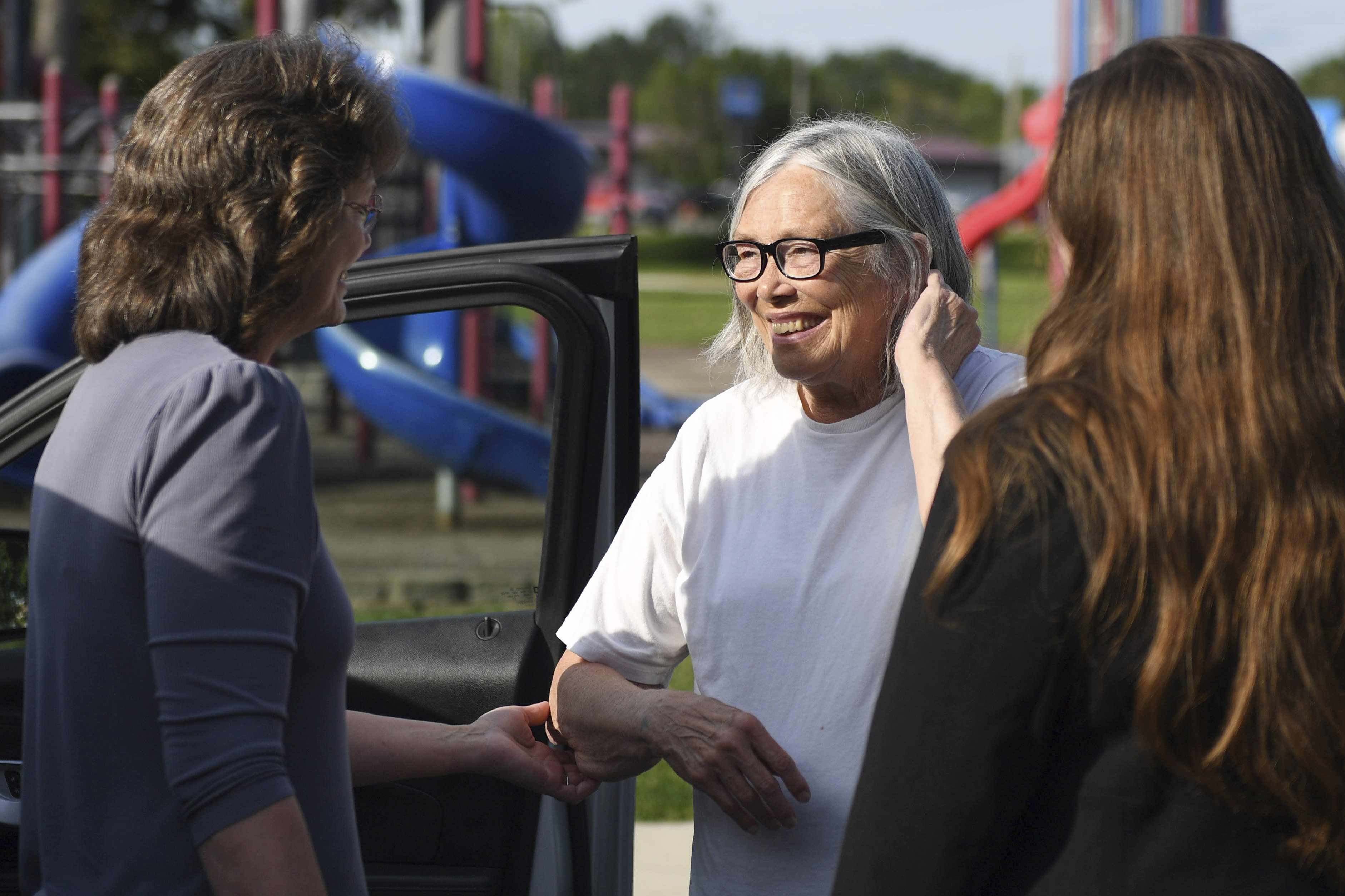 FILE - Sandra Hemme, center, meets with family and supporters after she was released from Chillicothe Correctional Center, Friday, July 19, 2024, in Chillicothe, Miss. (HG Biggs/The Kansas City Star via AP, File)