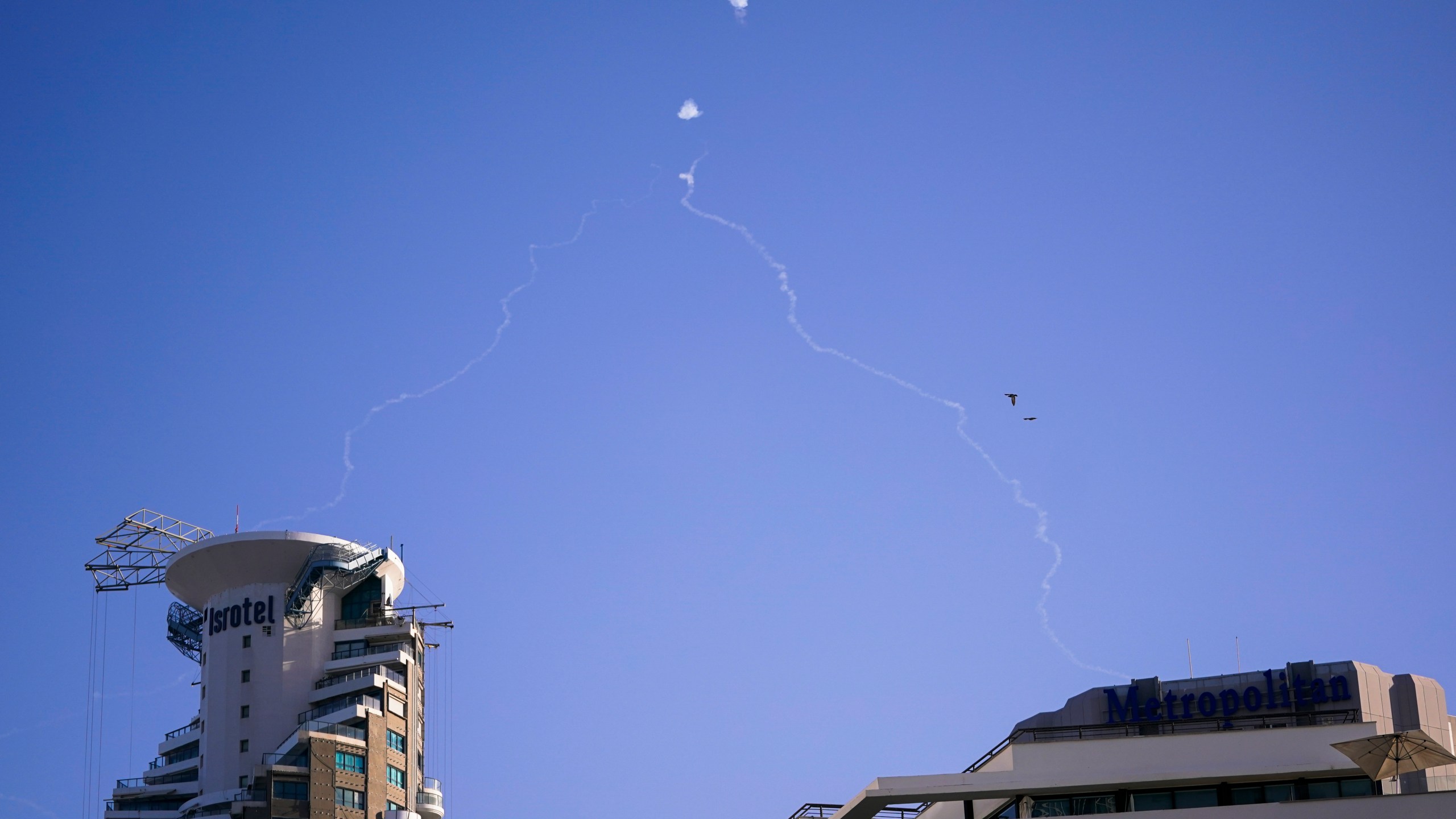 Israel's Iron Dome anti-missile system fires to intercept as air raid sirens sound in Tel Aviv, Wednesday, Oct. 23, 2024. (Nathan Howard/Pool Photo via AP)