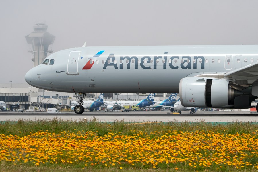 FILE - An American Airlines jet taxis at the Los Angeles International Airport in Los Angeles on April 12, 2024. (AP Photo/Damian Dovarganes, File)