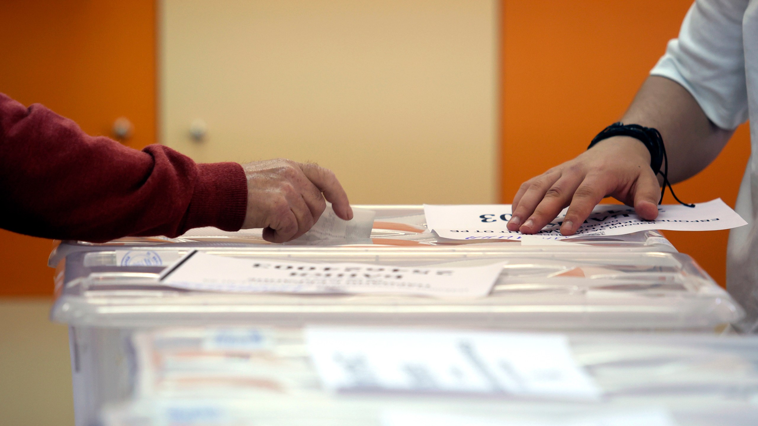 FILE - An early voter casts his vote in the polling station on the outskirts of Sofia, Bulgaria, June 9, 2024. (AP Photo/Valentina Petrova, File)