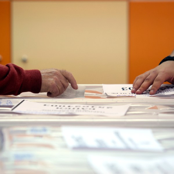 FILE - An early voter casts his vote in the polling station on the outskirts of Sofia, Bulgaria, June 9, 2024. (AP Photo/Valentina Petrova, File)