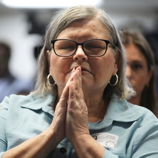 Diane Hernandez niece of Kitty Menendez sits prior to a news conference being held by Los Angeles County District Attorney George Gascon at the Hall of Justice on Thursday, Oct. 24, 2024, in Los Angeles. (AP Photo/Eric Thayer)