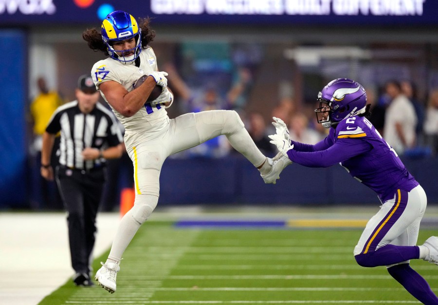 Los Angeles Rams wide receiver Puka Nacua (17) catches a pass as Minnesota Vikings cornerback Stephon Gilmore (2) defends during the second half of an NFL football game Thursday, Oct. 24, 2024, in Inglewood, Calif. (AP Photo/Mark J. Terrill)