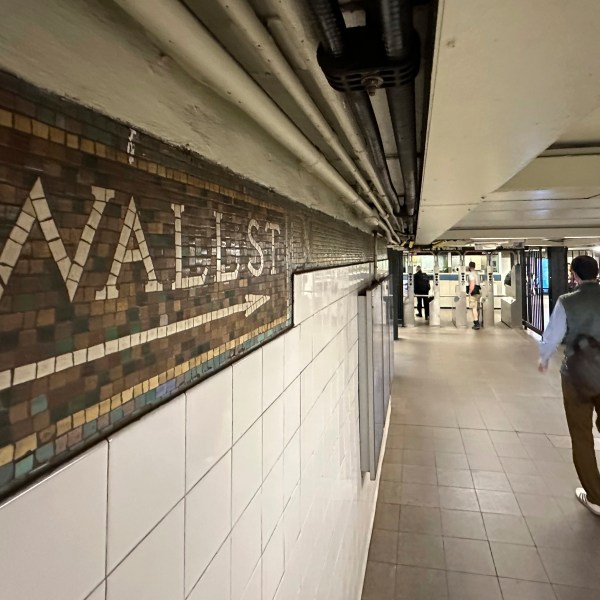 FILE - Commuters leave a Wall St. subway station in New York's Financial District on Oct. 23, 2024. (AP Photo/Peter Morgan, File)