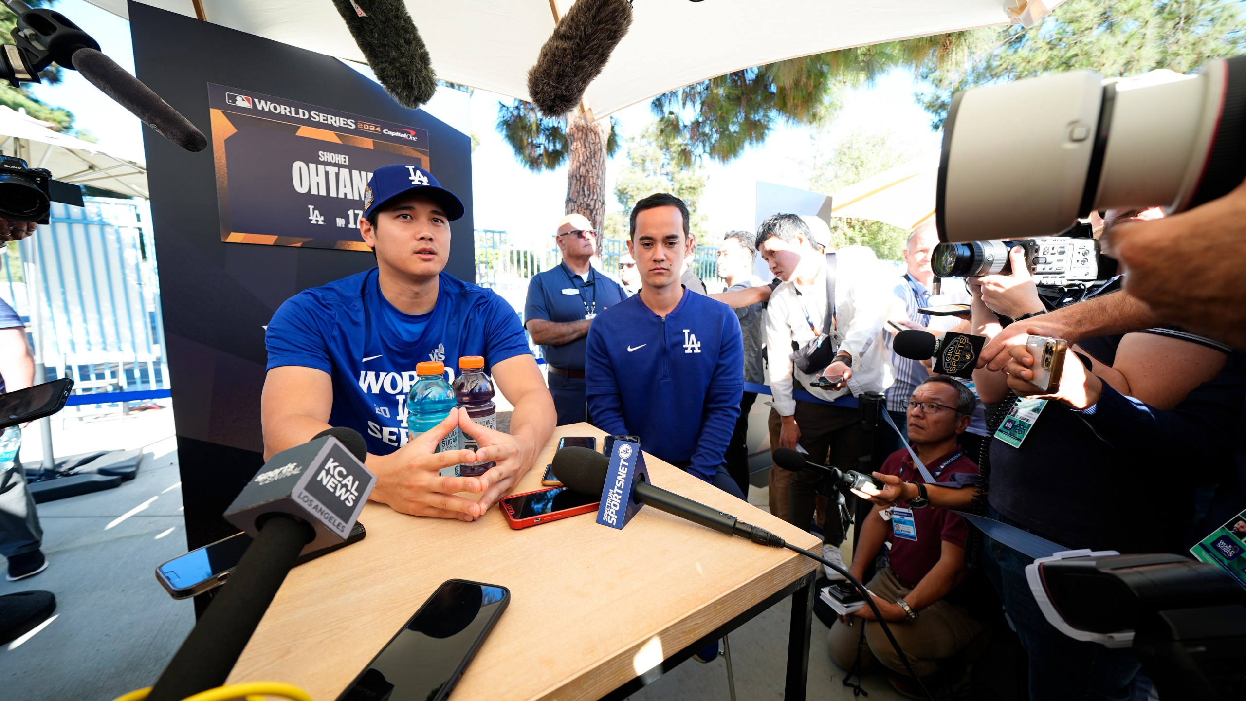 Los Angeles Dodgers' Shohei Ohtani speaks during media day for the baseball World Series against the New York Yankees, Thursday, Oct. 24, 2024, in Los Angeles. (AP Photo/Julio Cortez)