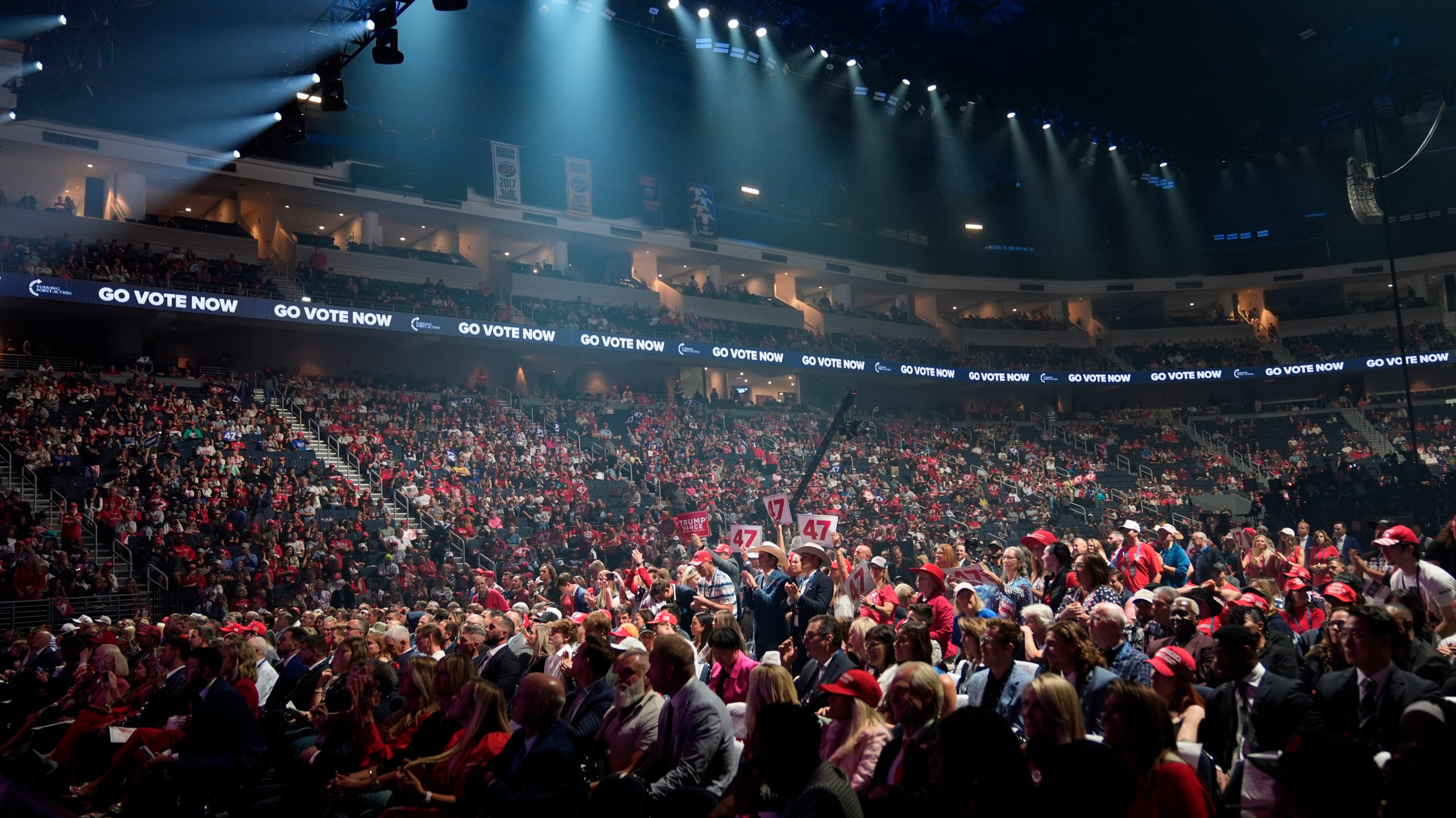 Supporters listen during a campaign rally with Republican presidential nominee former President Donald Trump Wednesday, Oct. 23, 2024, in Duluth, Ga. (AP Photo/Alex Brandon)