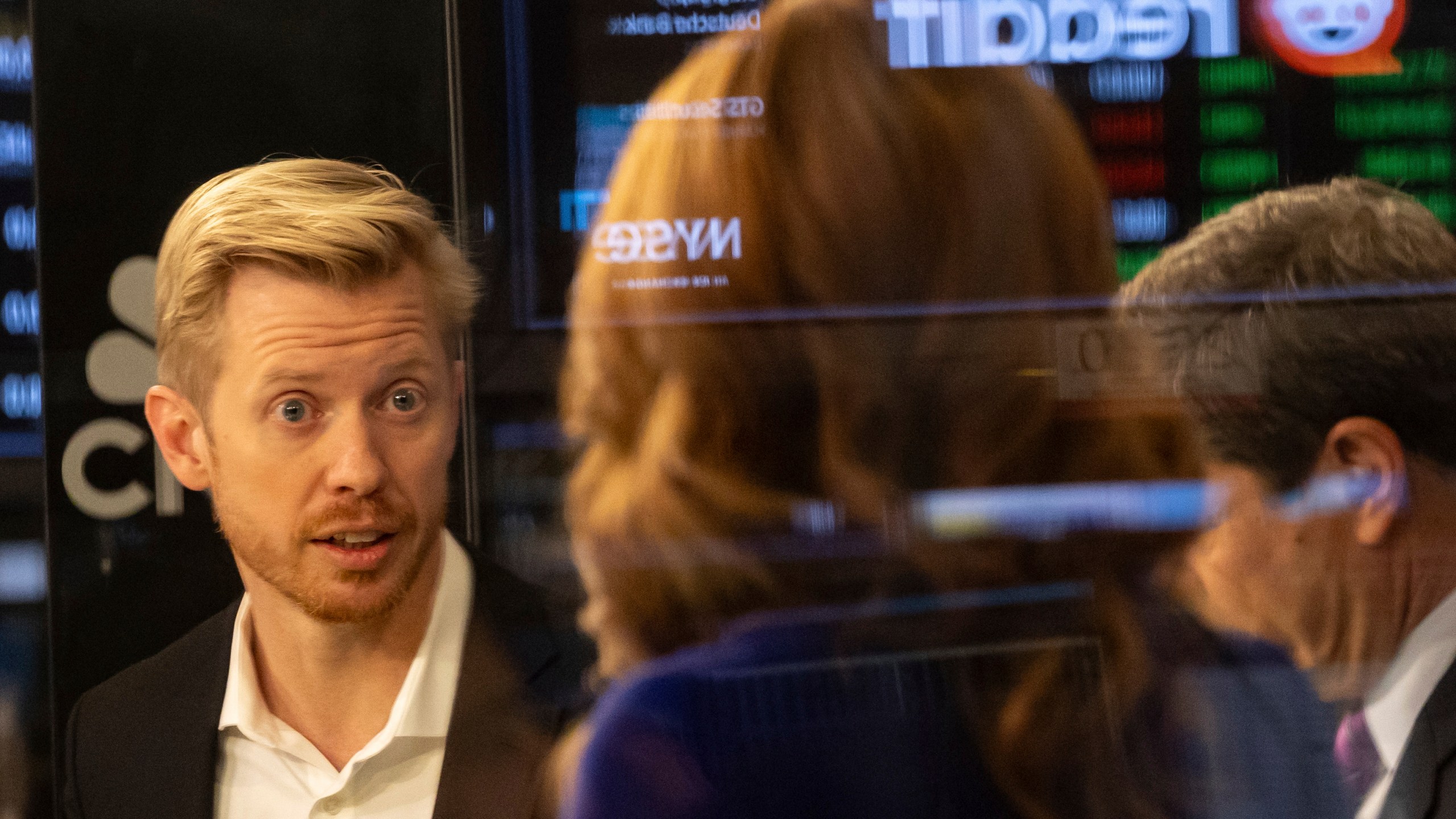 FILE - Reddit CEO Steve Huffman is seen on the New York Stock Exchange trading floor, prior to his company's IPO, March. 21, 2024. (AP Photo/Yuki Iwamura, File)