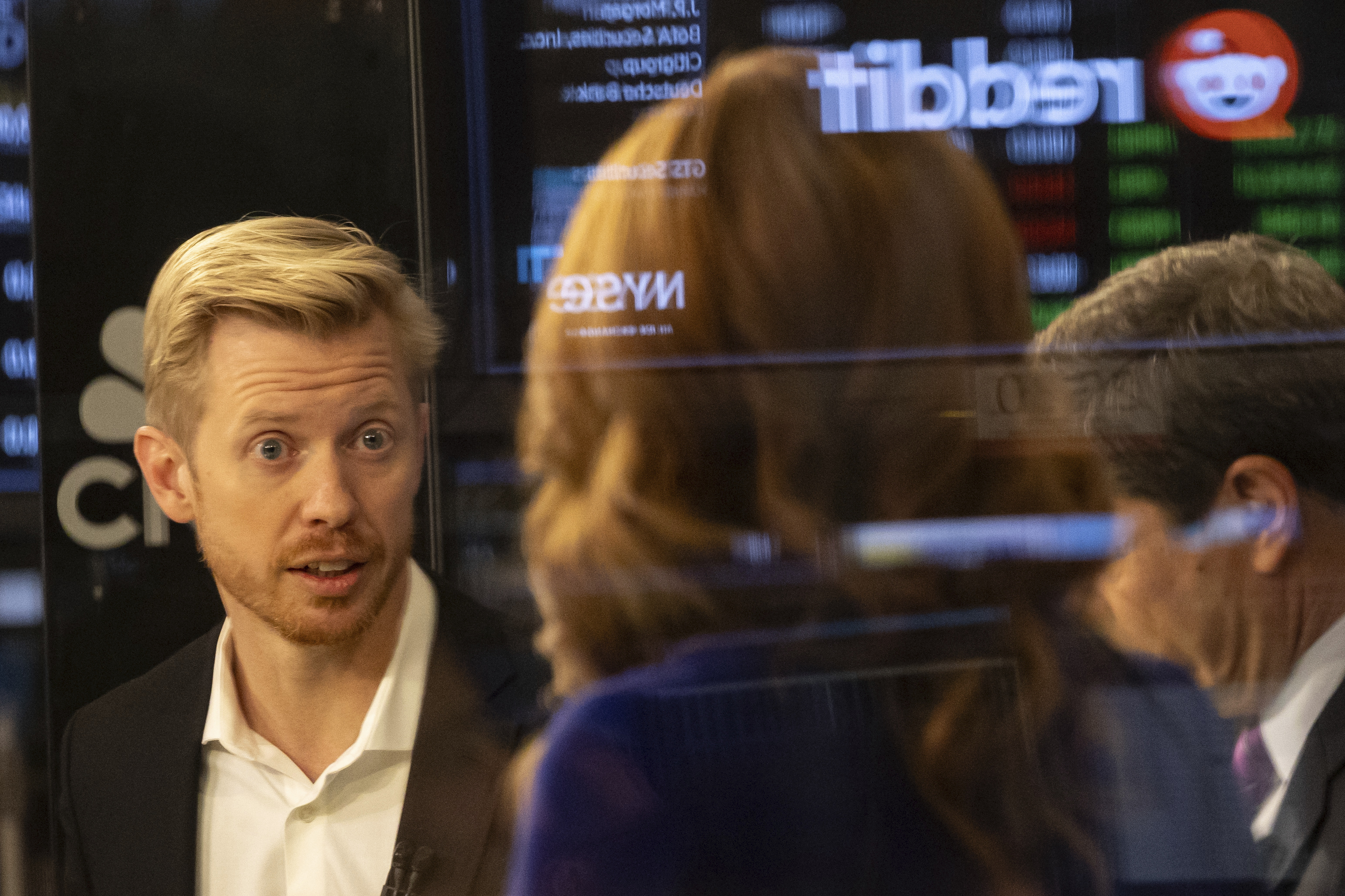 FILE - Reddit CEO Steve Huffman is seen on the New York Stock Exchange trading floor, prior to his company's IPO, March. 21, 2024. (AP Photo/Yuki Iwamura, File)