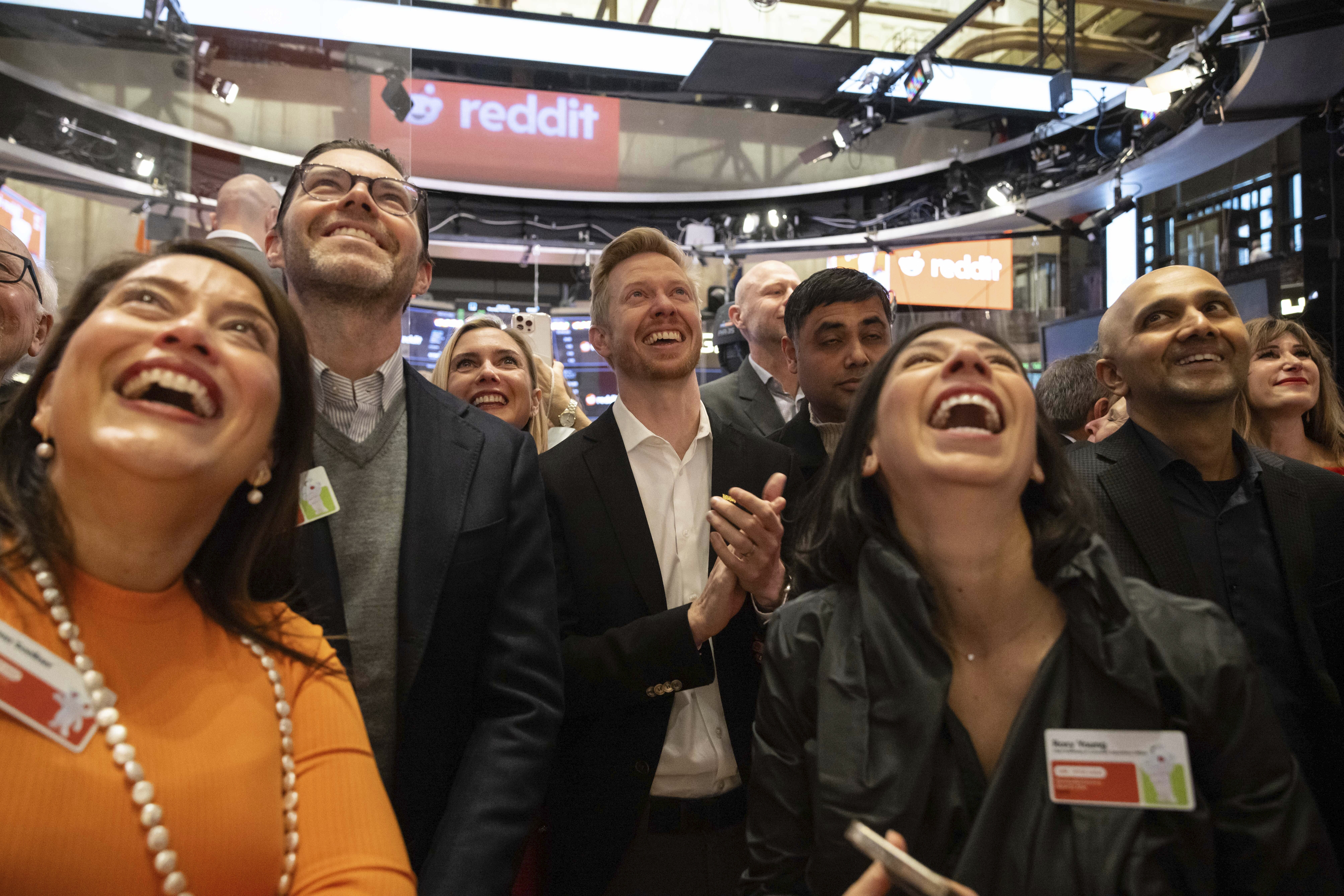 FILE - Reddit CEO Steve Huffman and company employees celebrate on the New York Stock Exchange trading floor, prior to his company's IPO, March. 21, 2024. (AP Photo/Yuki Iwamura, File)