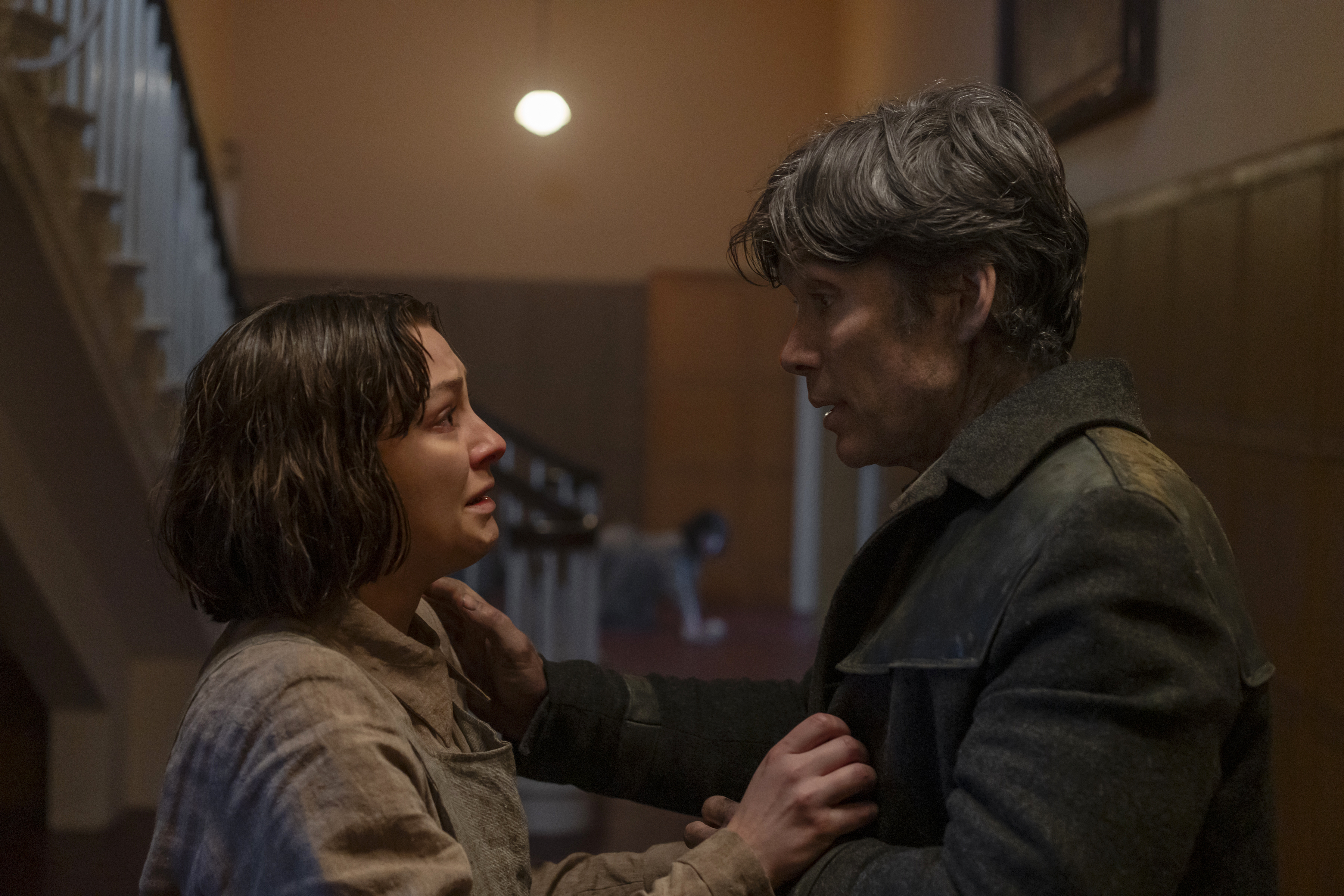 This image released by Lionsgate shows Zara Devin, left, and Cillian Murphy in a scene from "Small Things Like These." (Enda Bowe/Lionsgate via AP)