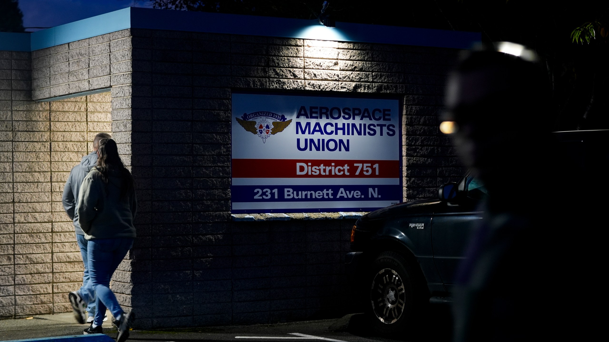 Boeing employees arrive to vote on a new contract offer from the company Monday, Nov. 4, 2024, at the Aerospace Machinists Union hall in Renton, Wash. (AP Photo/Lindsey Wasson)