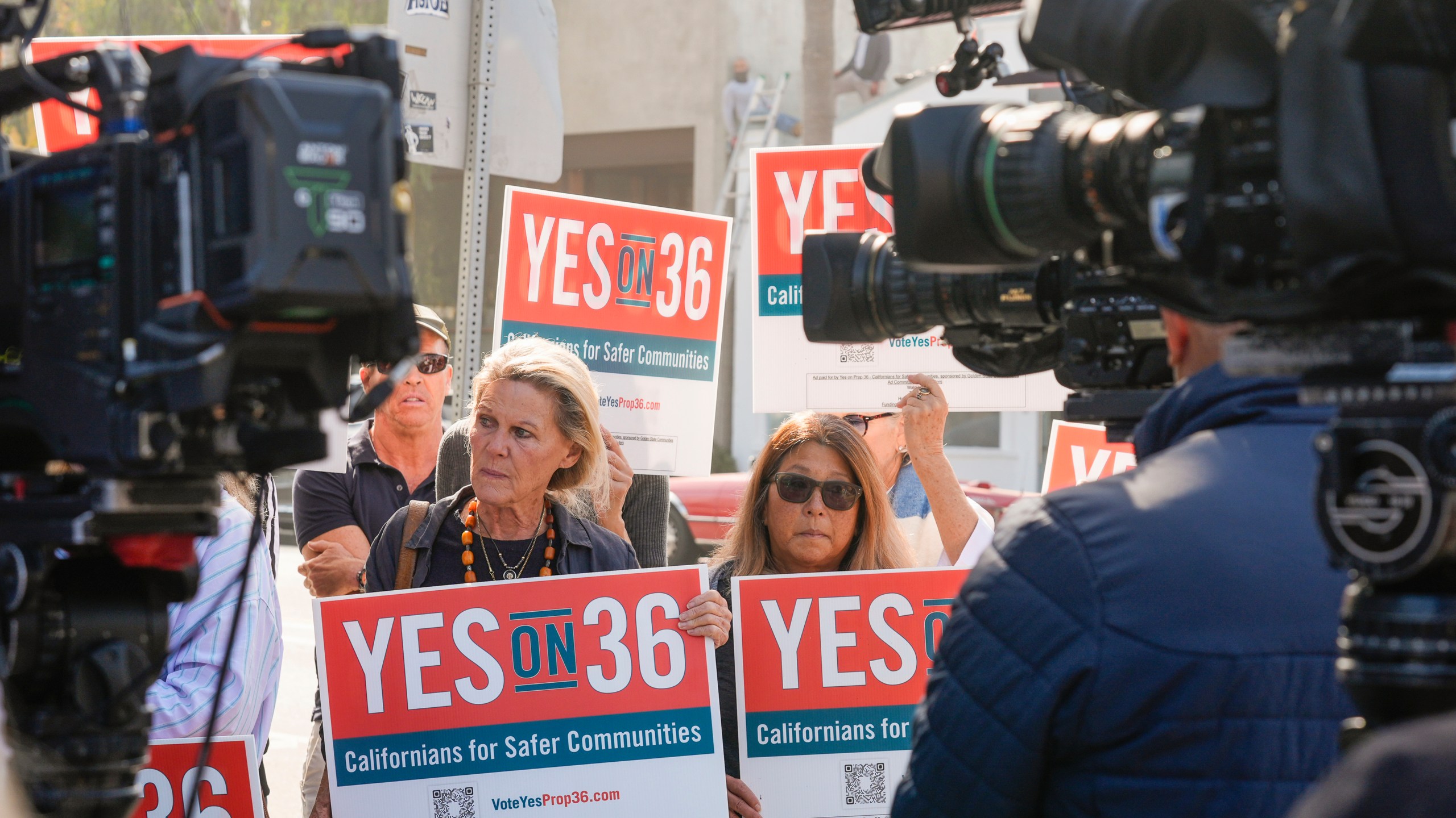 FILE - Neighbors and local business owners join in to support California's Proposition 36 on the November ballot at a news conference in the Venice neighborhood of Los Angeles on Monday, Sept. 30, 2024. (AP Photo/Damian Dovarganes, File)