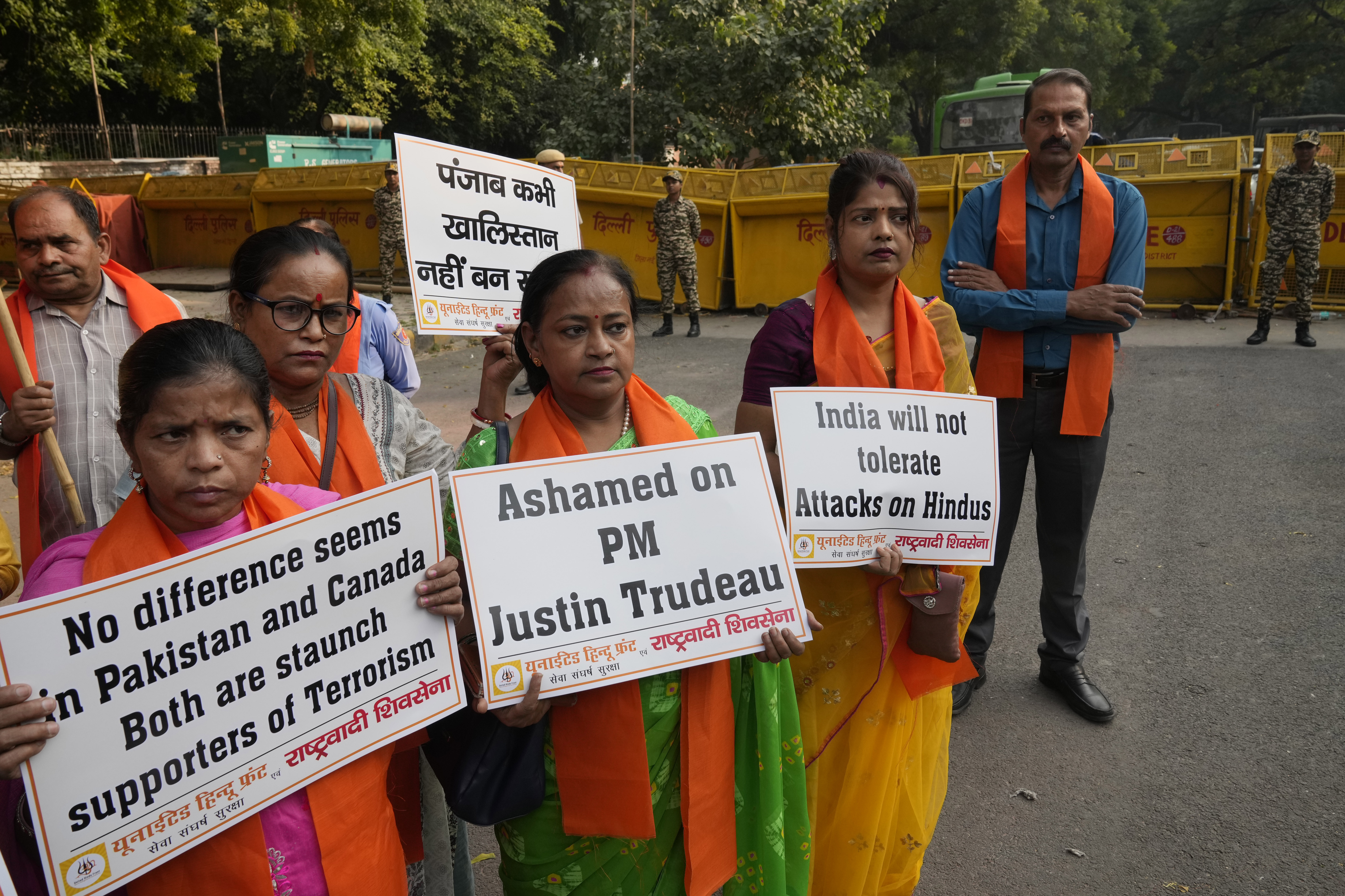 Activists of United Hindu Front, a right wing group reacting to Canada’s allegation that Indian Home Minister Amit Shah ordered the targeting of Sikh activists inside Canada, hold placards during a protest in New Delhi, India, Tuesday, Nov. 5, 2024. (AP Photo/Manish Swarup)