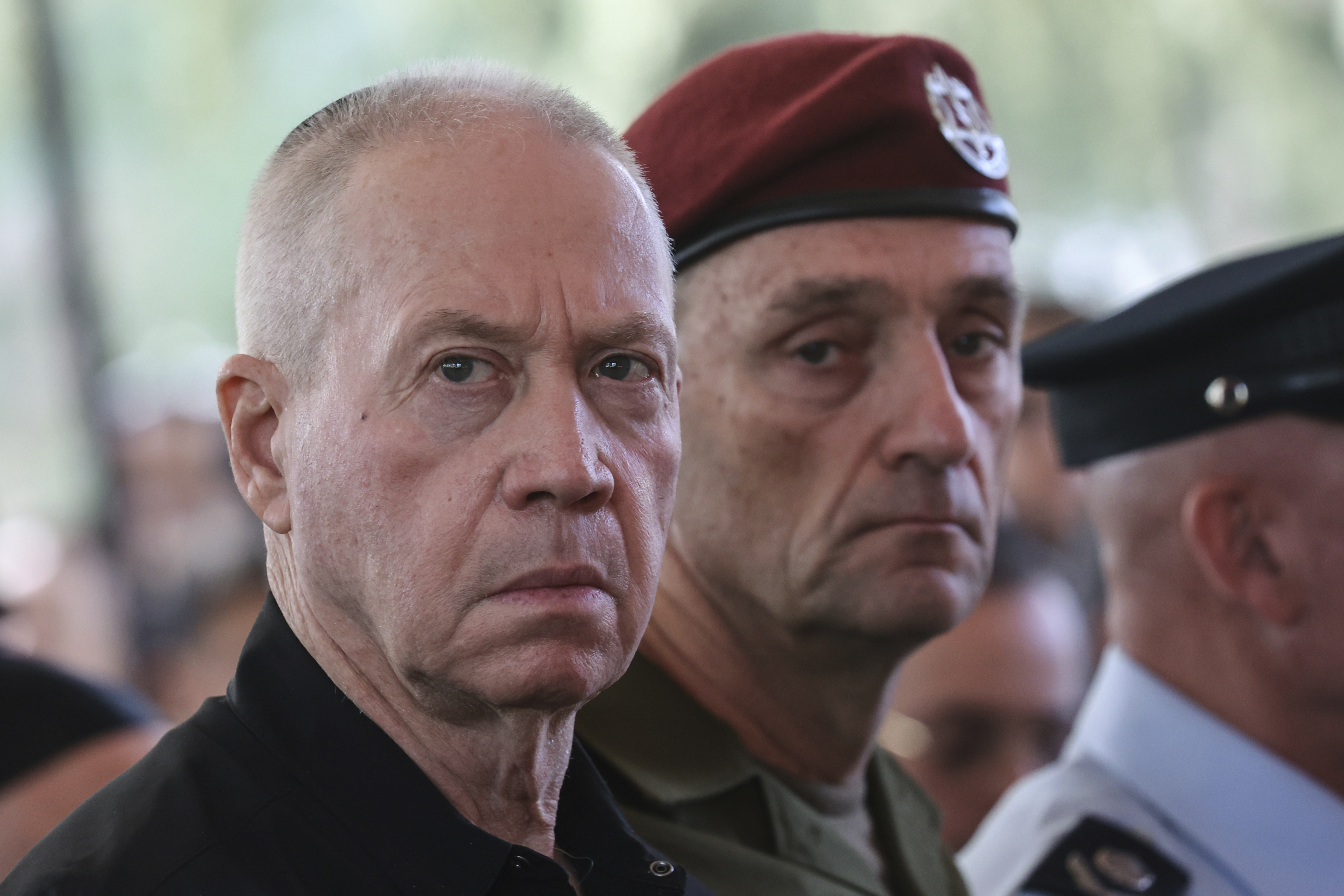 Israel's Defense Minister Yoav Gallant, left, and Chief of the General Staff Lieutenant-General Herzi Halevi, attend a ceremony marking the Hebrew calendar anniversary of the Hamas attack on October 7 last year that sparked the ongoing war in Gaza, at the Mount Herzl military cemetery in Jerusalem, Israel Sunday Oct. 27, 2024. (Gil Cohen-Magen/Pool Photo via AP)