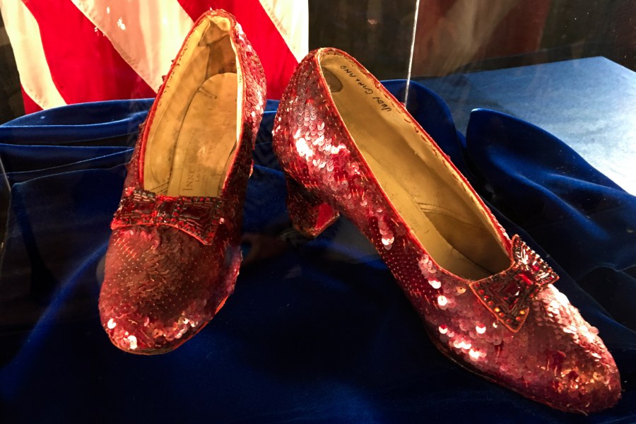 FILE - Ruby slippers once worn by Judy Garland in the "The Wizard of Oz," are displayed at a news conference, Sept. 4, 2018, at the FBI office in Brooklyn Center, Minn. (AP Photo/Jeff Baenen, File)