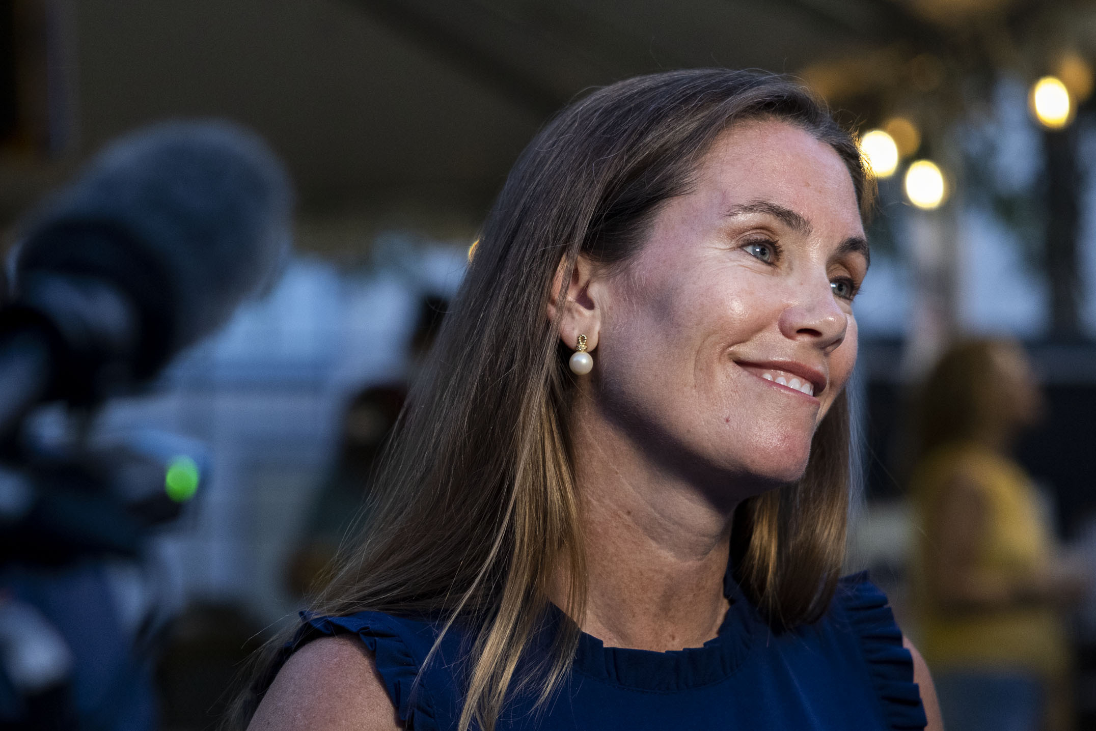 Missy Cotter Smasal speaks to members of the media at Ballyhoos in Virginia Beach, Va., after winning the Democratic nomination in the race to represent the 2nd Congressional District in the U.S. House of Representatives, June 18, 2024. (Kendall Warner/The Virginian-Pilot via AP)