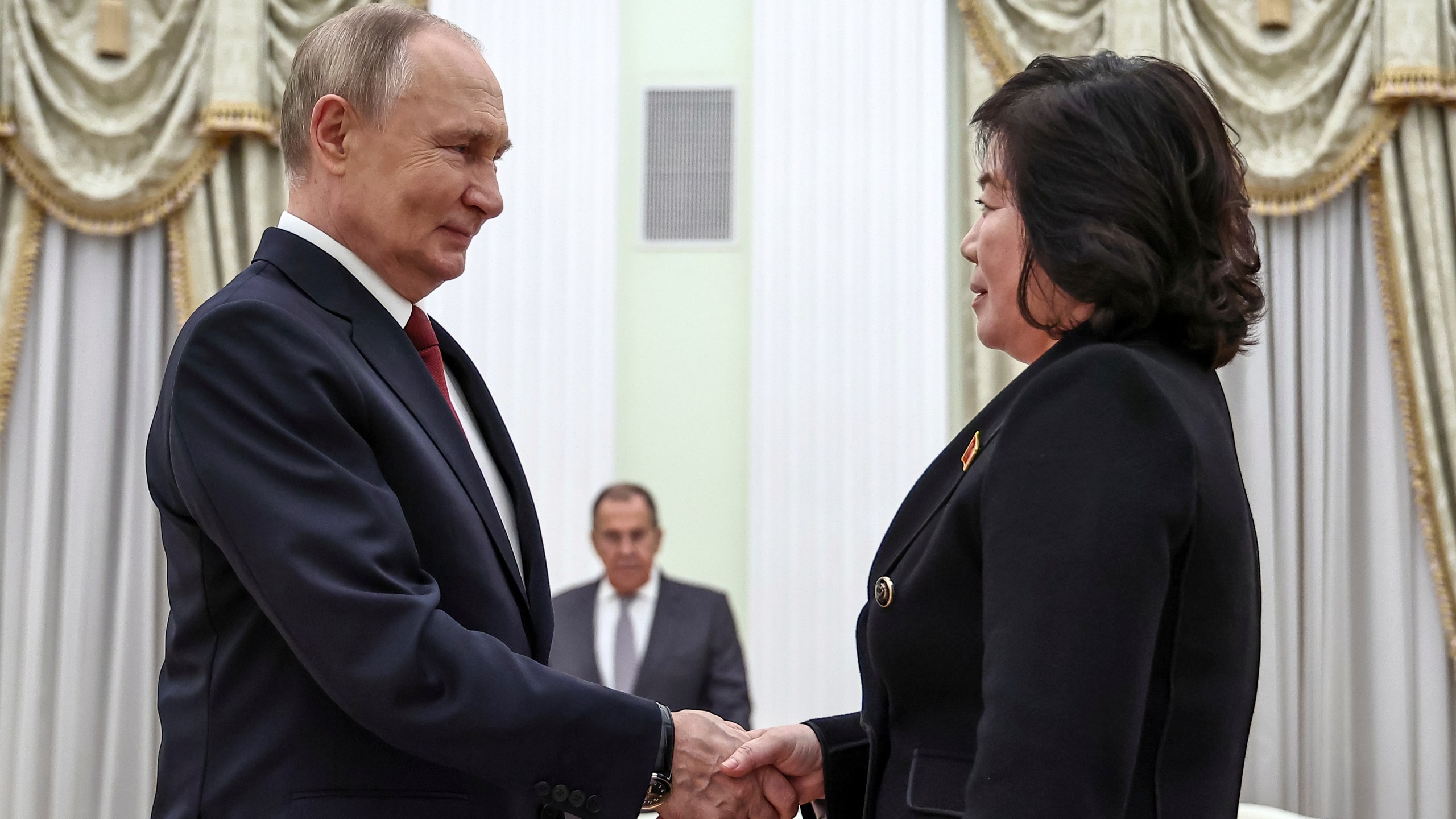 Russian President Vladimir Putin greets North Korean Foreign Minister Choe Son Hui during their meeting at the Kremlin in Moscow, Russia, Monday, Nov. 4, 2024. (Mikhail Tereshchenko, Sputnik, Kremlin Pool Photo via AP)