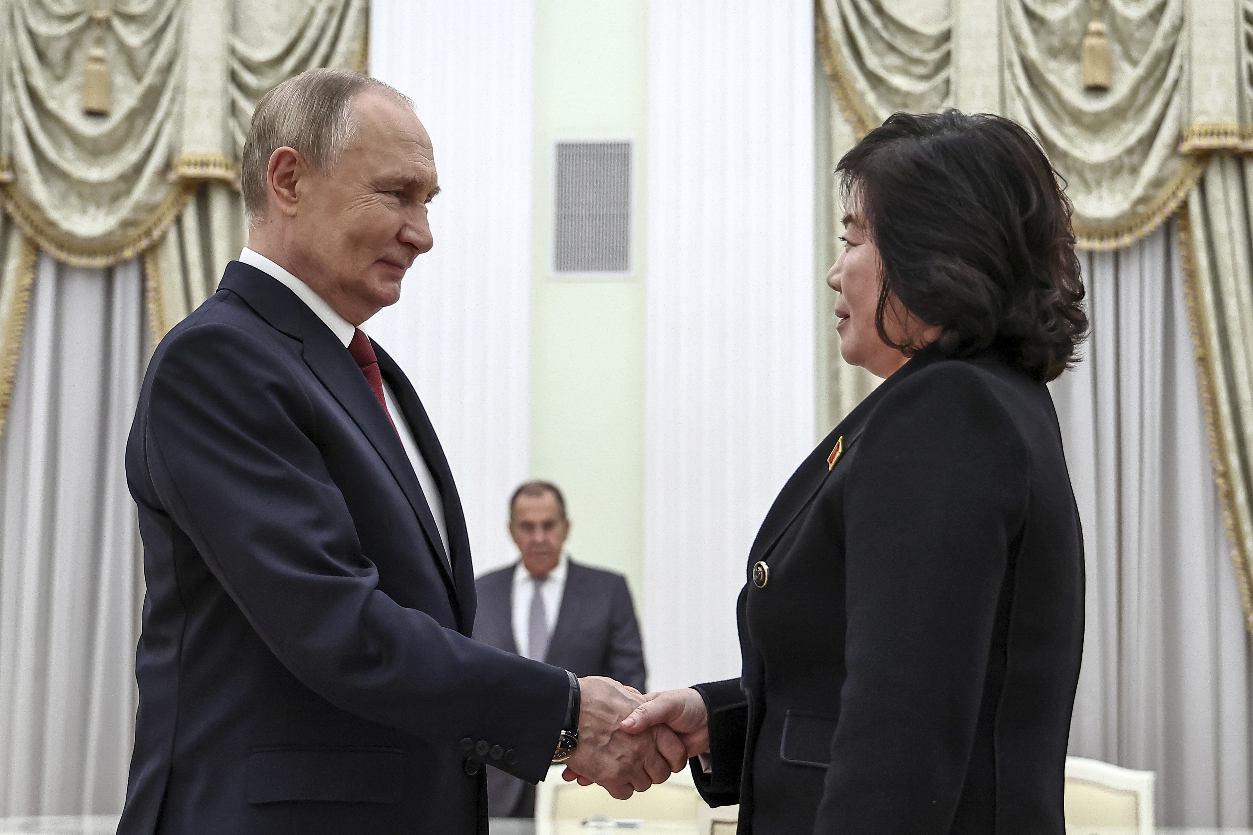 Russian President Vladimir Putin greets North Korean Foreign Minister Choe Son Hui during their meeting at the Kremlin in Moscow, Russia, Monday, Nov. 4, 2024. (Mikhail Tereshchenko, Sputnik, Kremlin Pool Photo via AP)