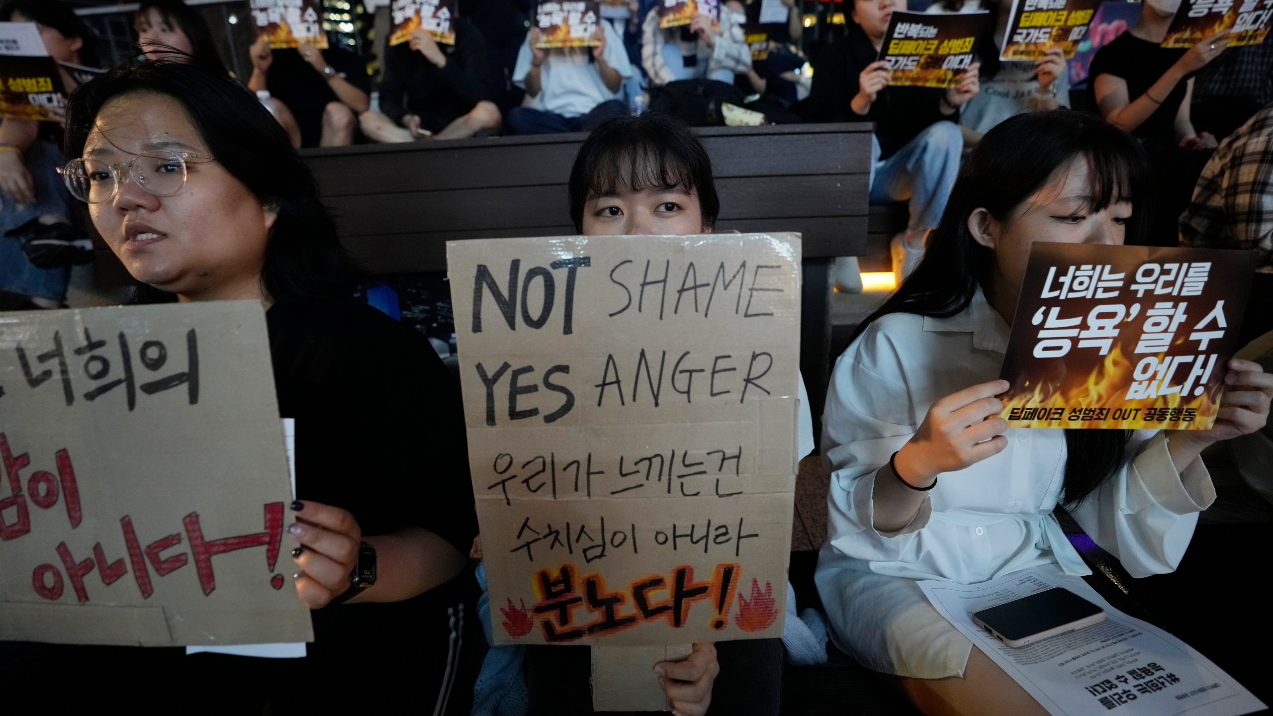 FILE - Citizens stage a rally against deepfake sex crime in Seoul, South Korea, on Sept. 27, 2024. (AP Photo/Ahn Young-joon, File)