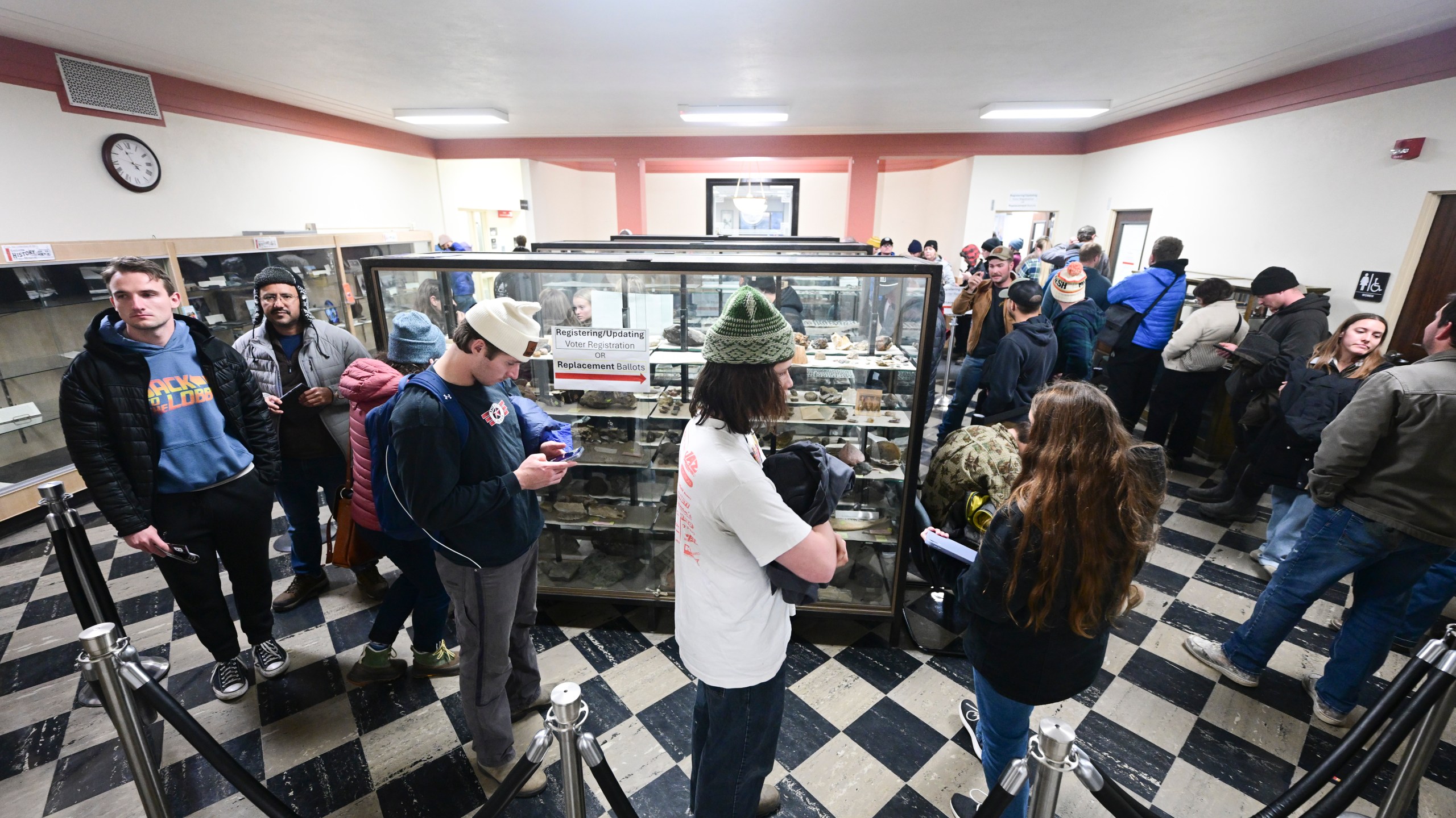 Voters line up inside the Gallatin County Courthouse in Bozeman, Mont., on Tuesday, Nov. 5, 2024. (AP Photo/Tommy Martino)