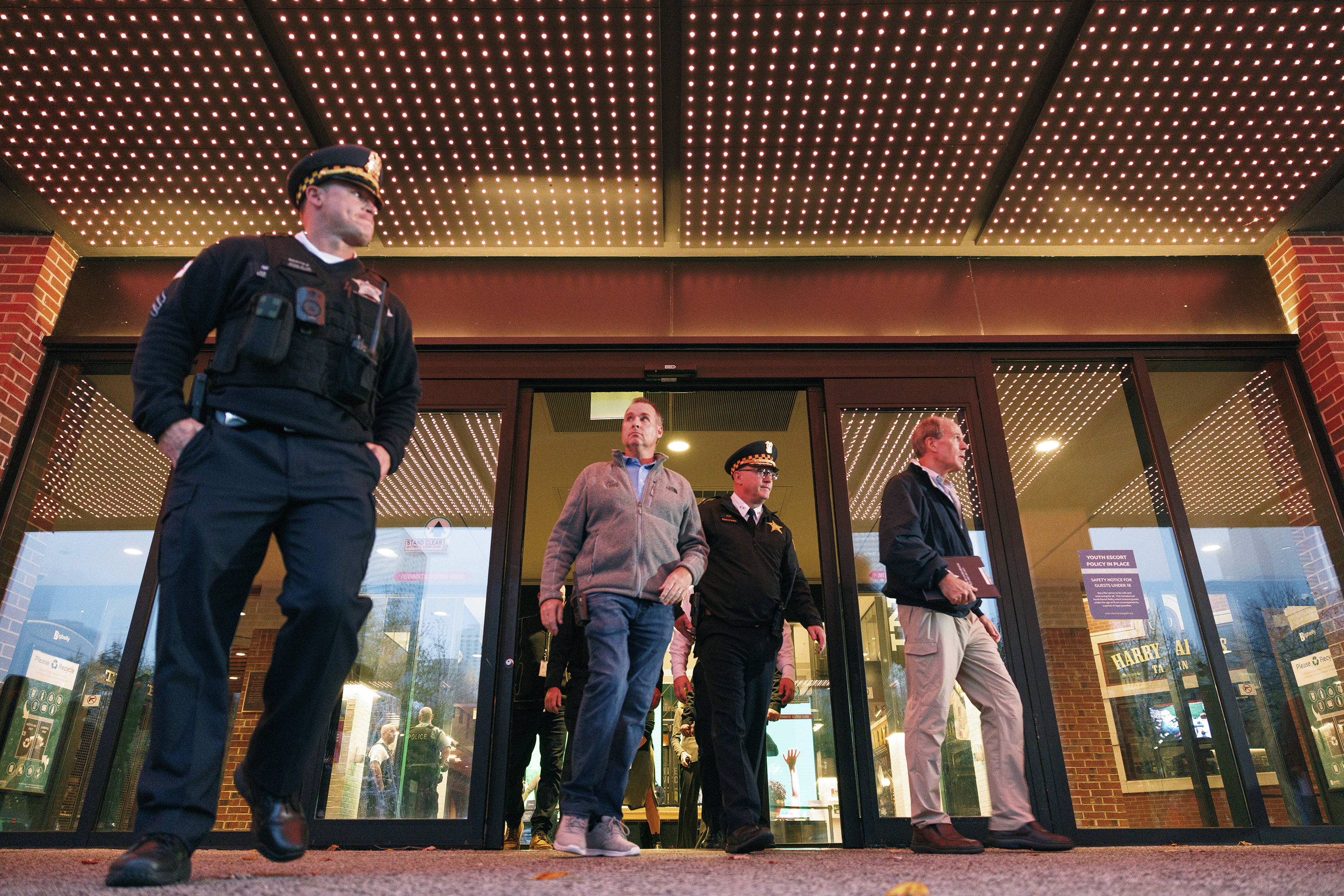 Police investigate the scene of a shooting at Navy Pier in Chicago, Tuesday, Nov. 5, 2024. Two men were shot and killed by a former disgruntled employee in one of the loading docks at Navy Pier. (Anthony Vazquez/Chicago Sun-Times via AP)