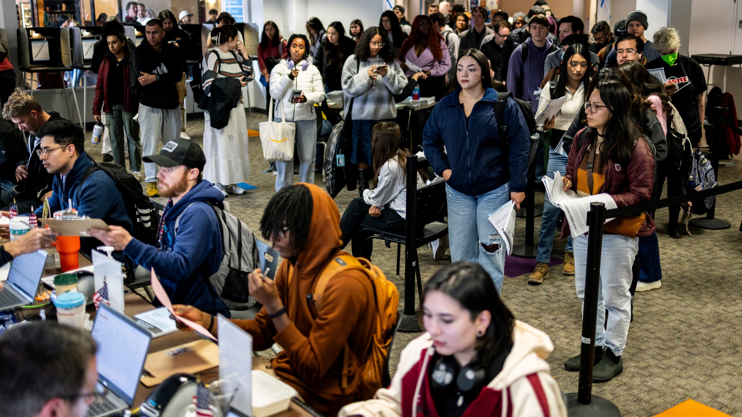 Voters cast ballots in Denver on Election Day, Tuesday, Nov. 5, 2024. (AP Photo/Chet Stgrange)