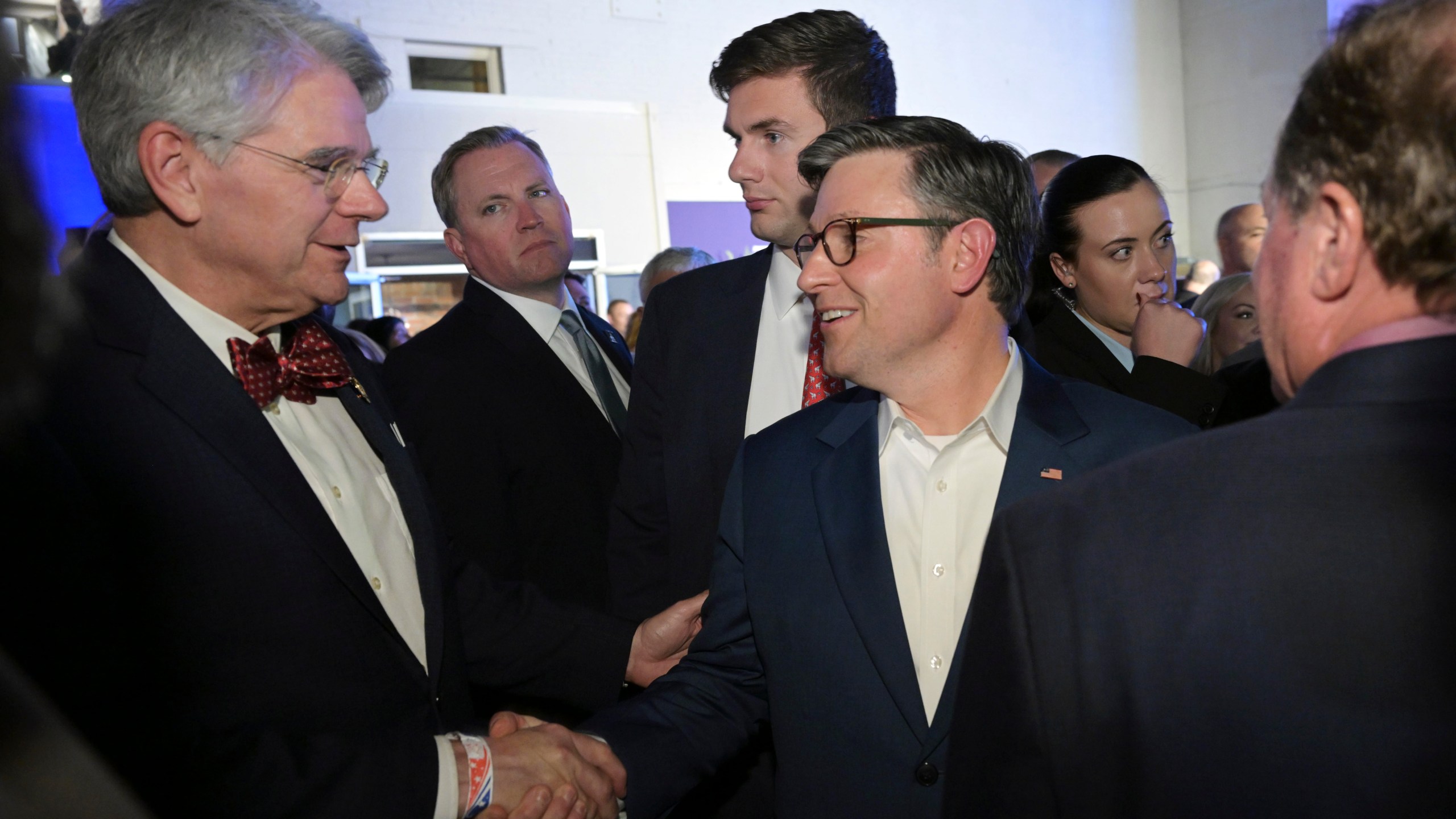 House Speaker Mike Johnson, R-La., greets Louisiana Associate Justice Jay B. McCallum during an election night watch party Tuesday, Nov. 5, 2024, in Shreveport, La. (AP Photo/Matthew Hinton)