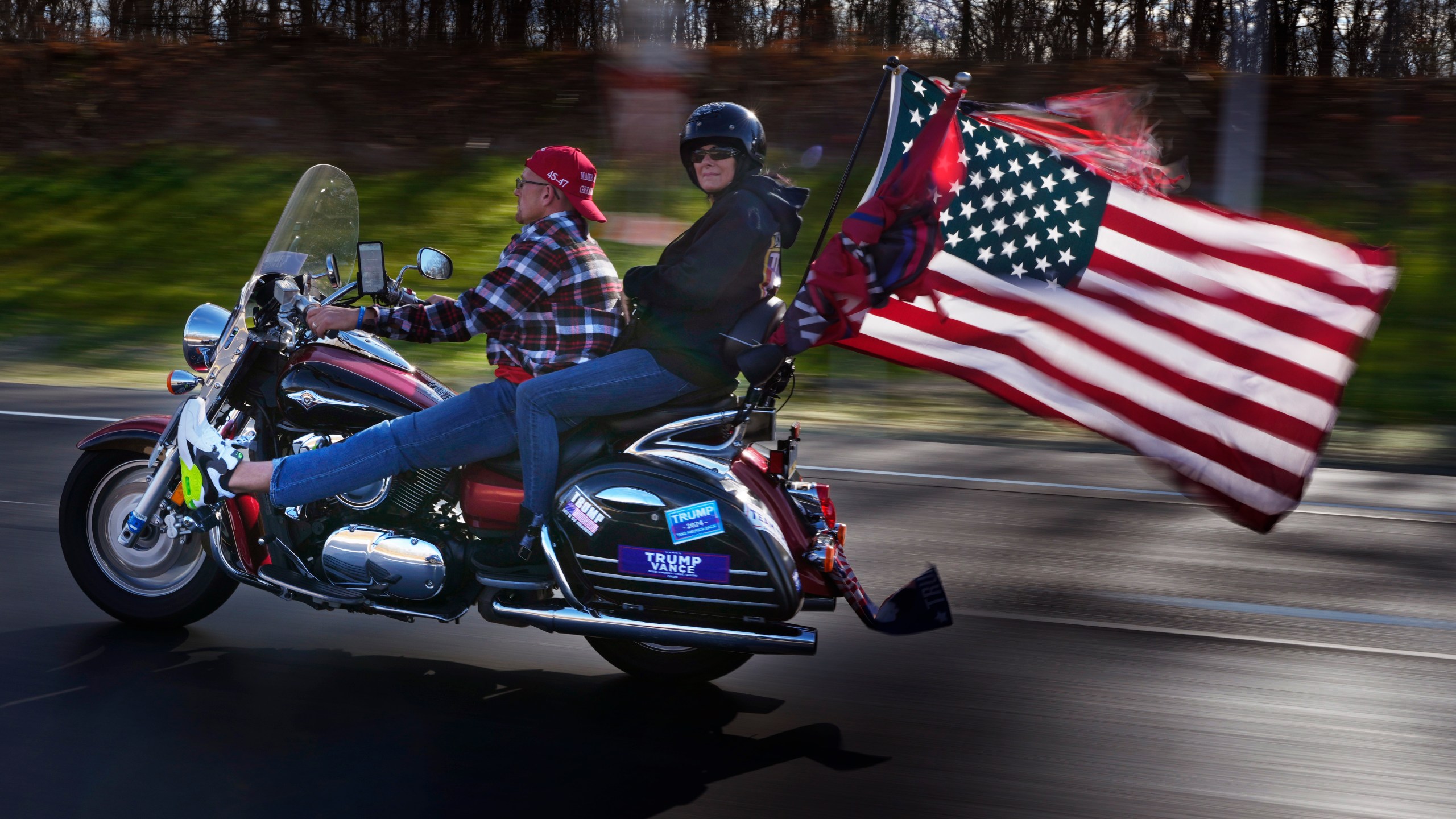 Bikers show their support for President-elect Donald Trump while riding on I-84, Wednesday, Nov. 6, 2024, near Lords Valley, Pa. (AP Photo/Robert F. Bukaty)