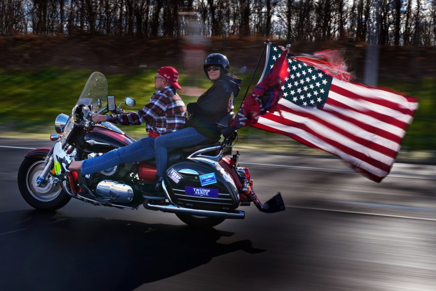 Bikers show their support for President-elect Donald Trump while riding on I-84, Wednesday, Nov. 6, 2024, near Lords Valley, Pa. (AP Photo/Robert F. Bukaty)