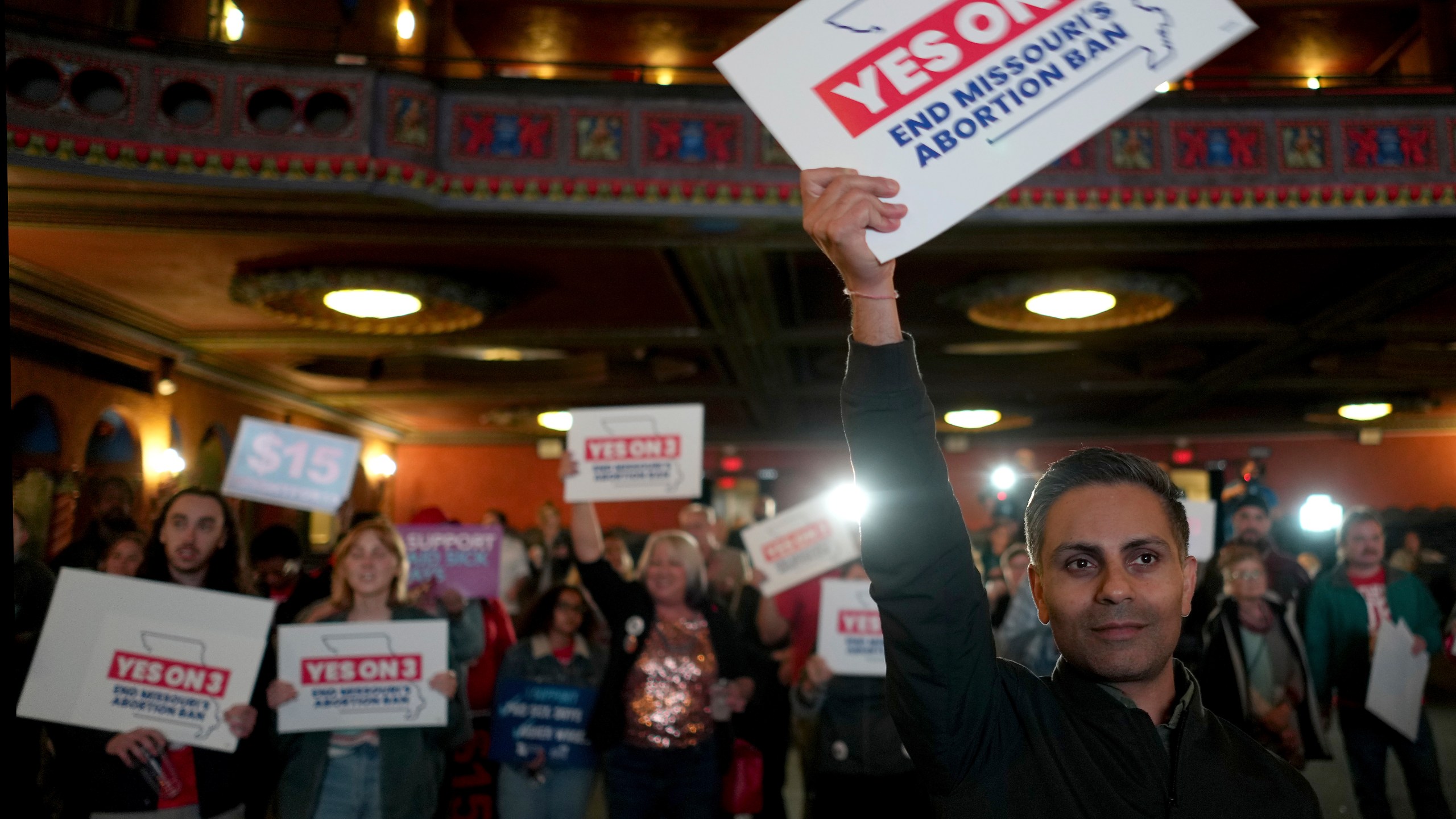 People at an election night watch party react after an abortion rights amendment to the Missouri constitution passed, Tuesday, Nov. 5, 2024, in Kansas City, Mo. (AP Photo/Charlie Riedel)