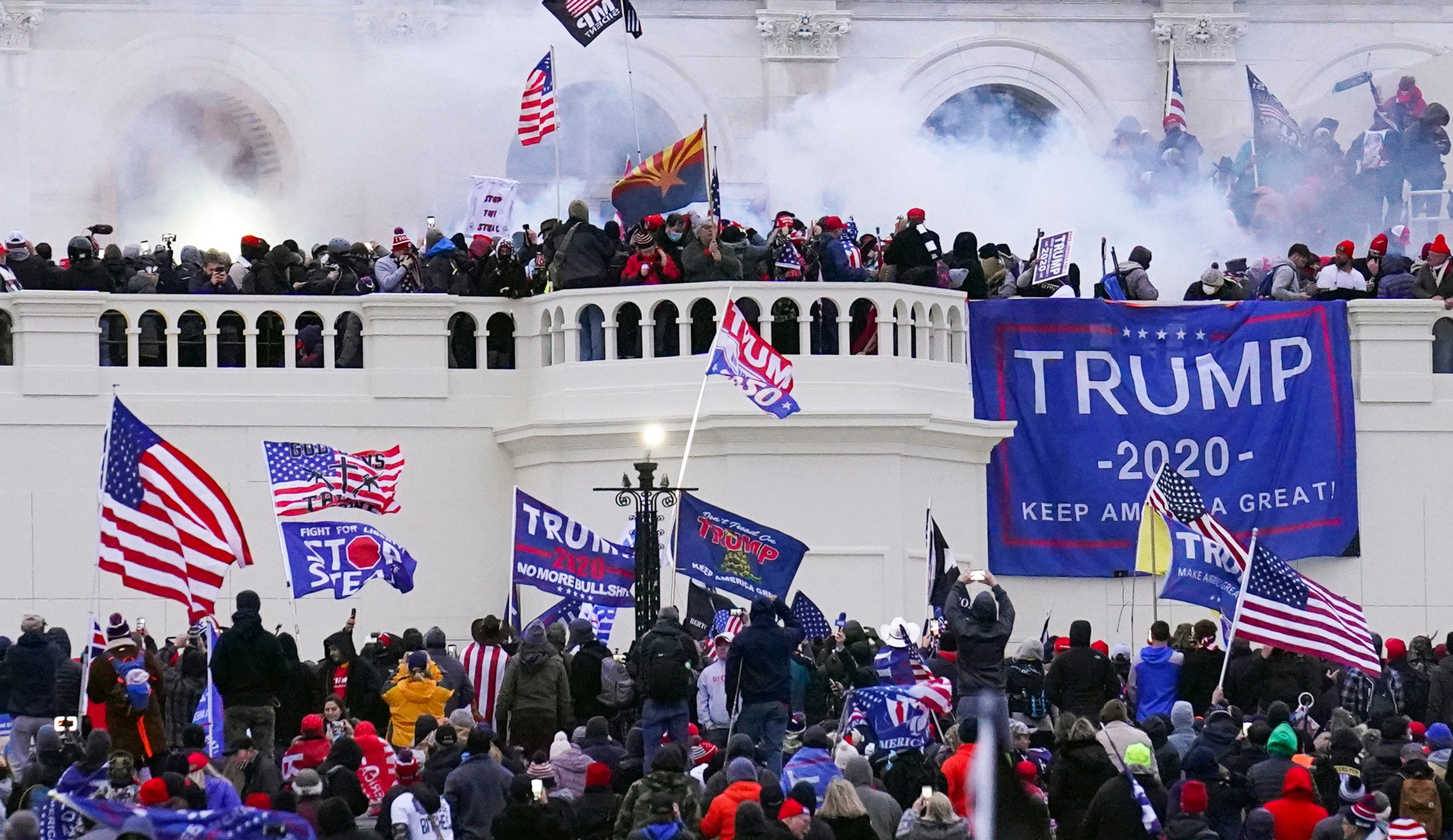 FILE - Rioters storm the West Front of the U.S. Capitol Jan. 6, 2021, in Washington. (AP Photo/John Minchillo, File)