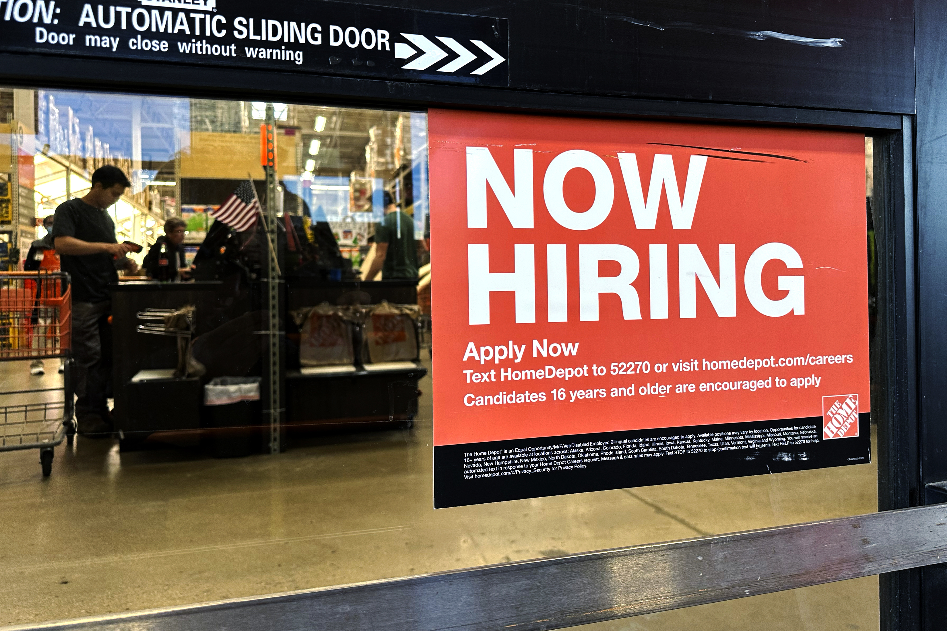 A hiring sign is displayed at a retail store in Mount Prospect, Ill., Saturday, Nov. 2, 2024. (AP Photo/Nam Y. Huh)