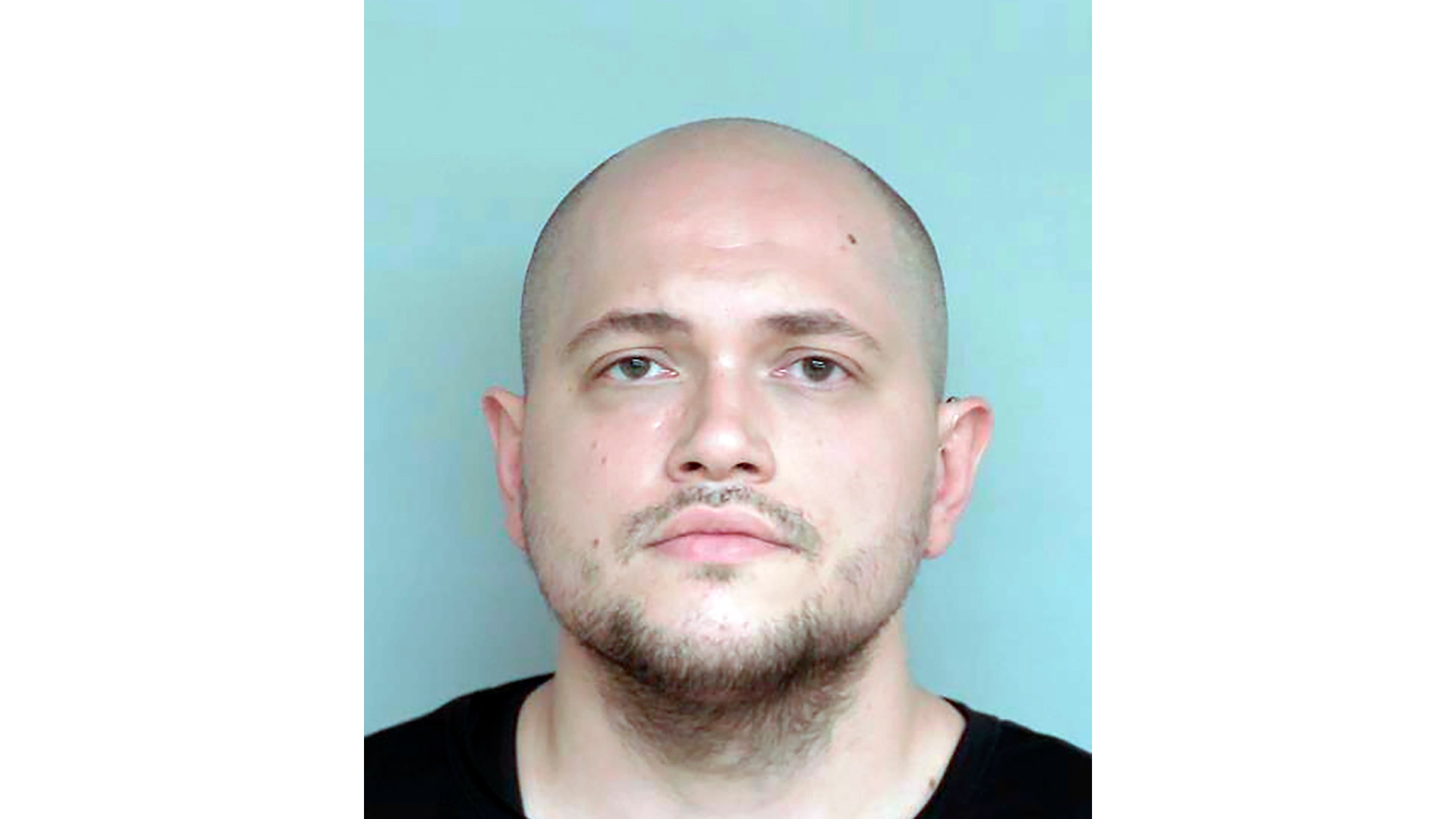 FILE - This undated booking photo provided by the Winona County, Minn., Detention Center shows Adam Fravel. (Winona County Detention Center via AP, File)