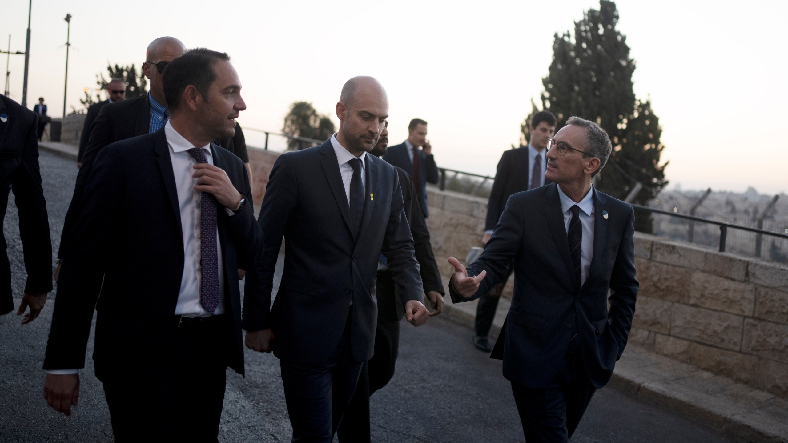 French Foreign Minister Jean-Noël Barrot, center, walks with staff on the Mount of Olives during his visit to Jerusalem, Thursday, Nov. 7, 2024. (AP Photo/Maya Alleruzzo)