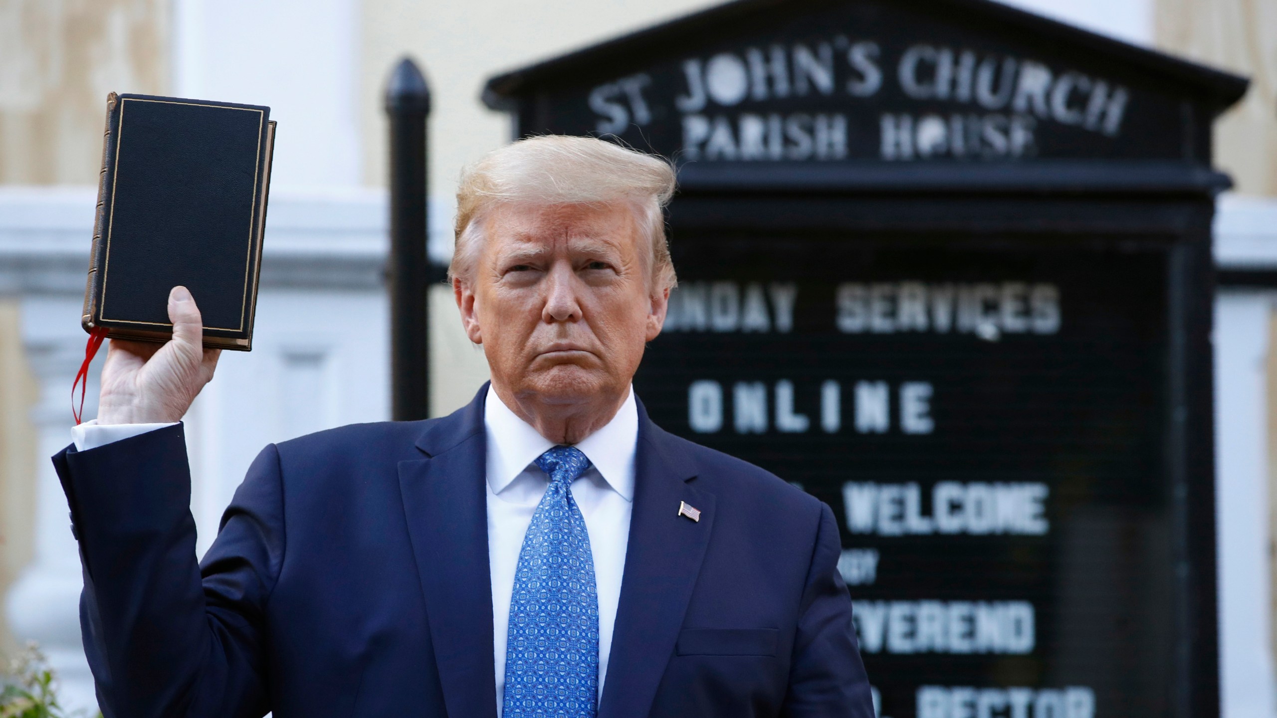 FILE - President Donald Trump holds a Bible as he visits outside St. John's Church, June 1, 2020, in Washington. (AP Photo/Patrick Semansky, File)