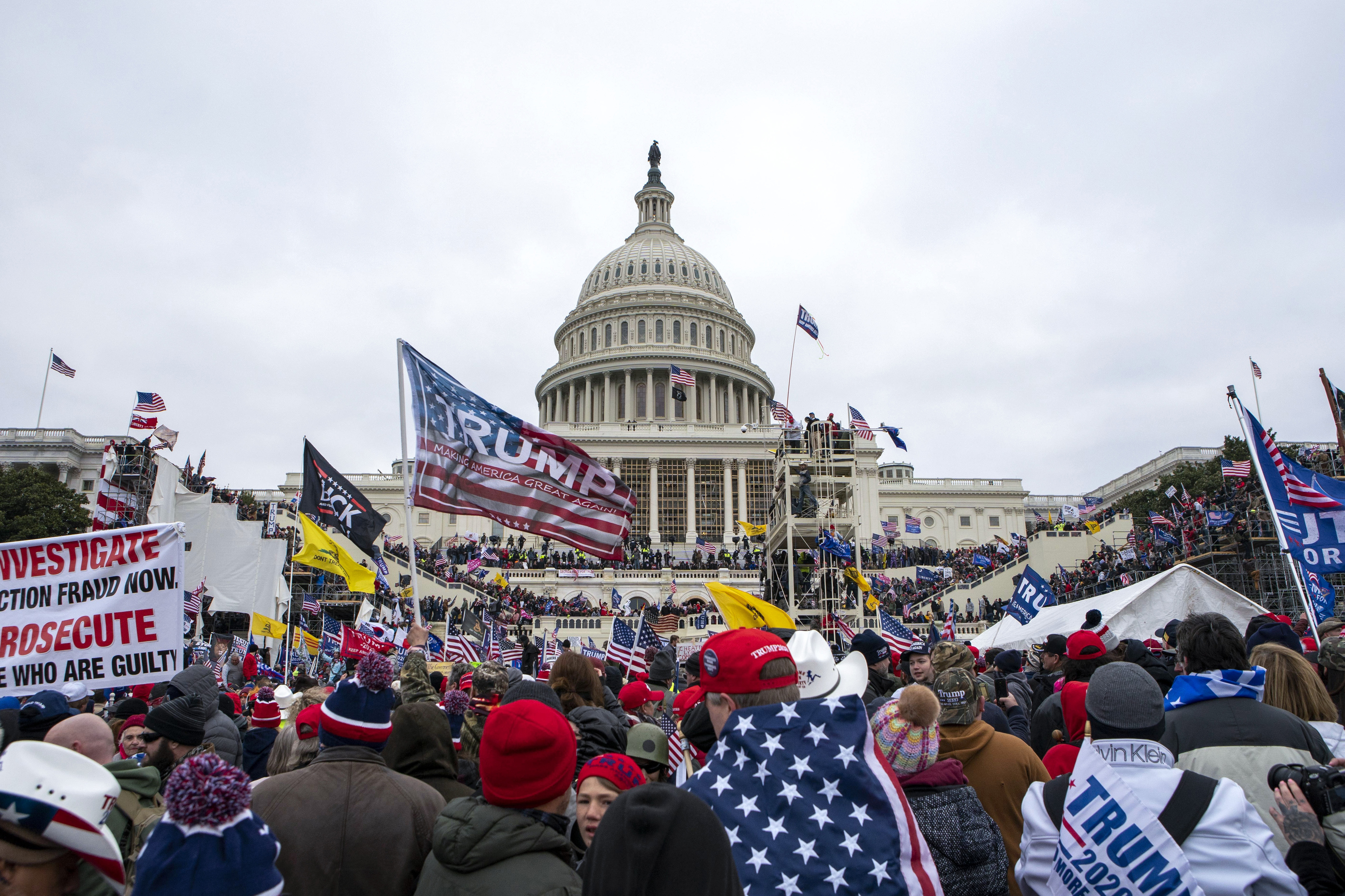 FILE - Rioters loyal to President Donald Trump rally at the U.S. Capitol in Washington on Jan. 6, 2021. (AP Photo/Jose Luis Magana, File)